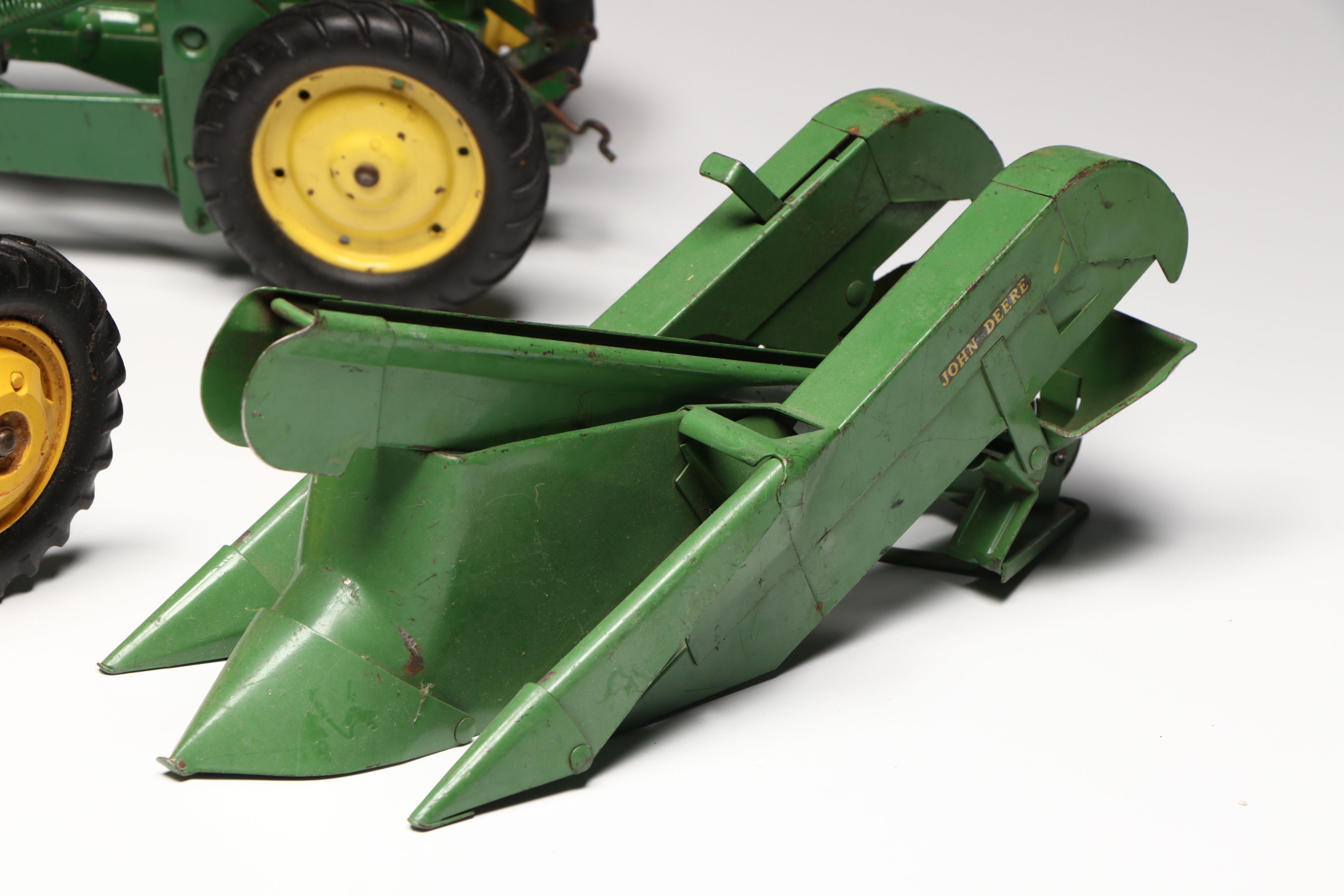 John Deere, Caterpillar, and More Pressed Steel Vintage Farm Vehicle Toys