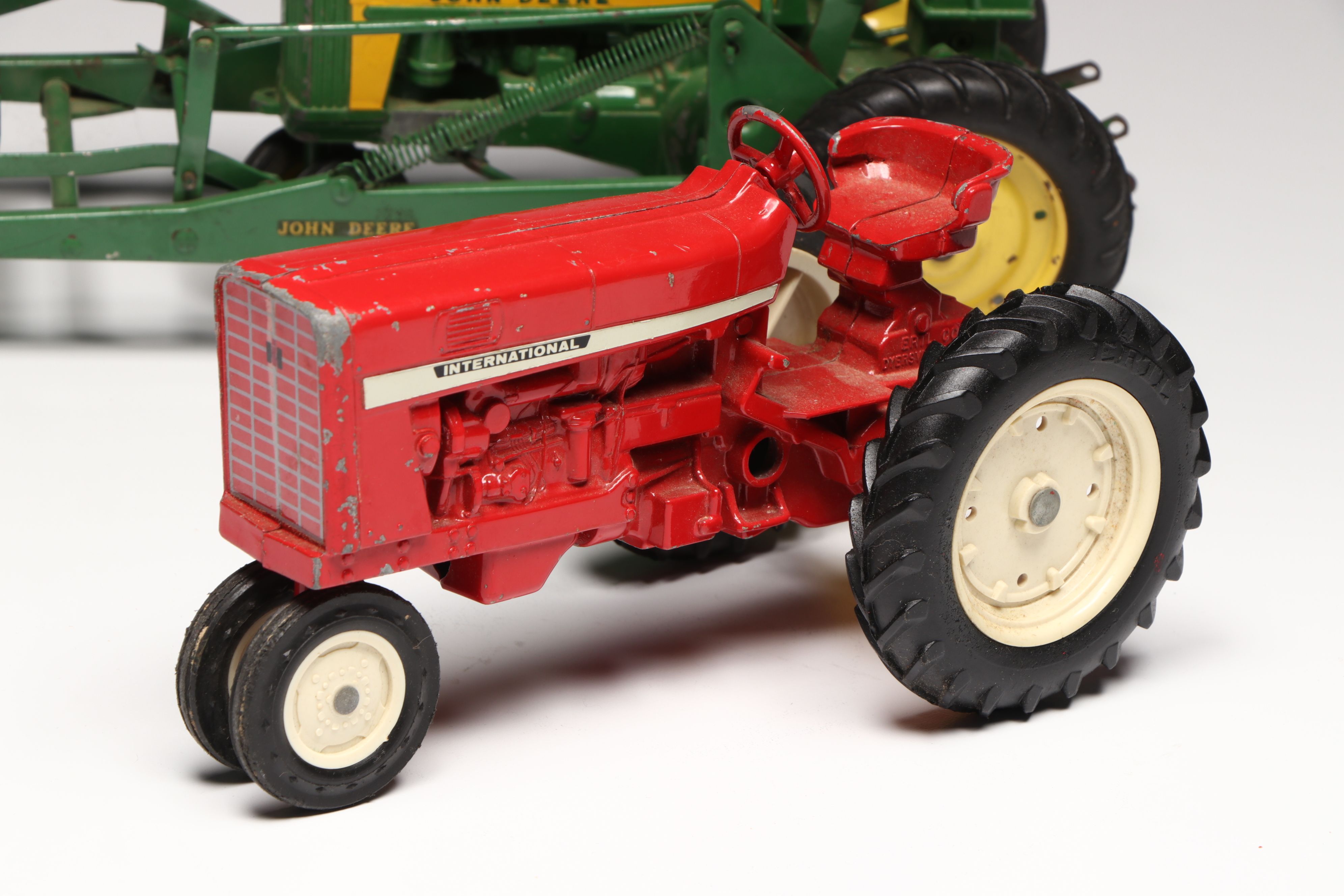 John Deere, Caterpillar, and More Pressed Steel Vintage Farm Vehicle Toys