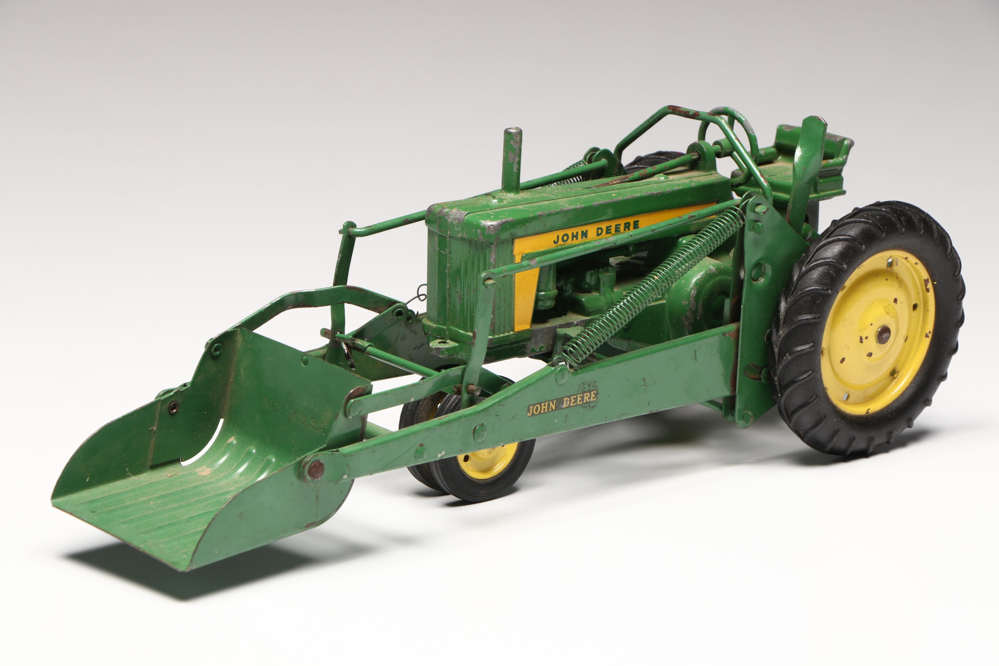John Deere, Caterpillar, and More Pressed Steel Vintage Farm Vehicle Toys