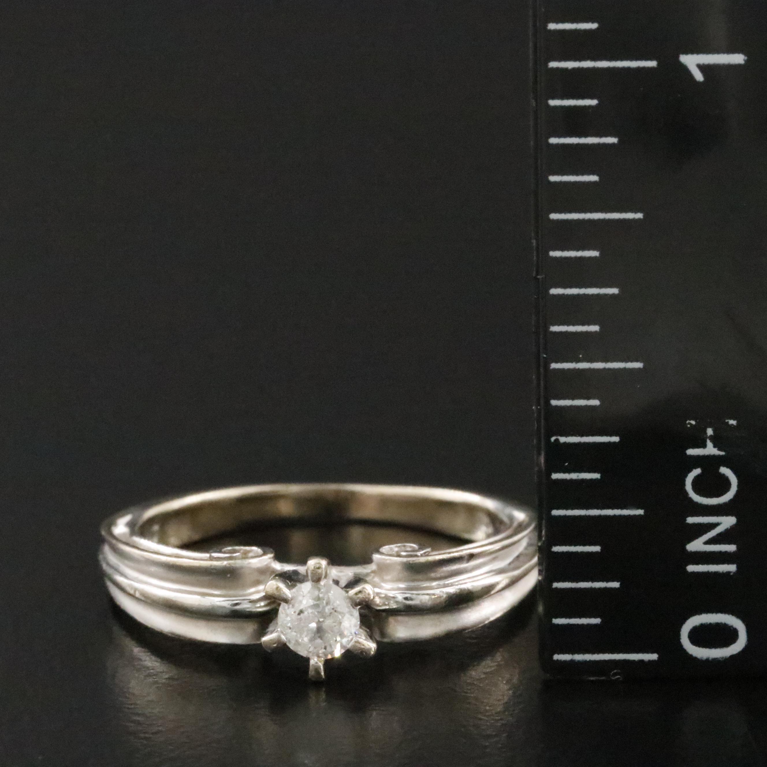 10K 0.15 CT Diamond Ring