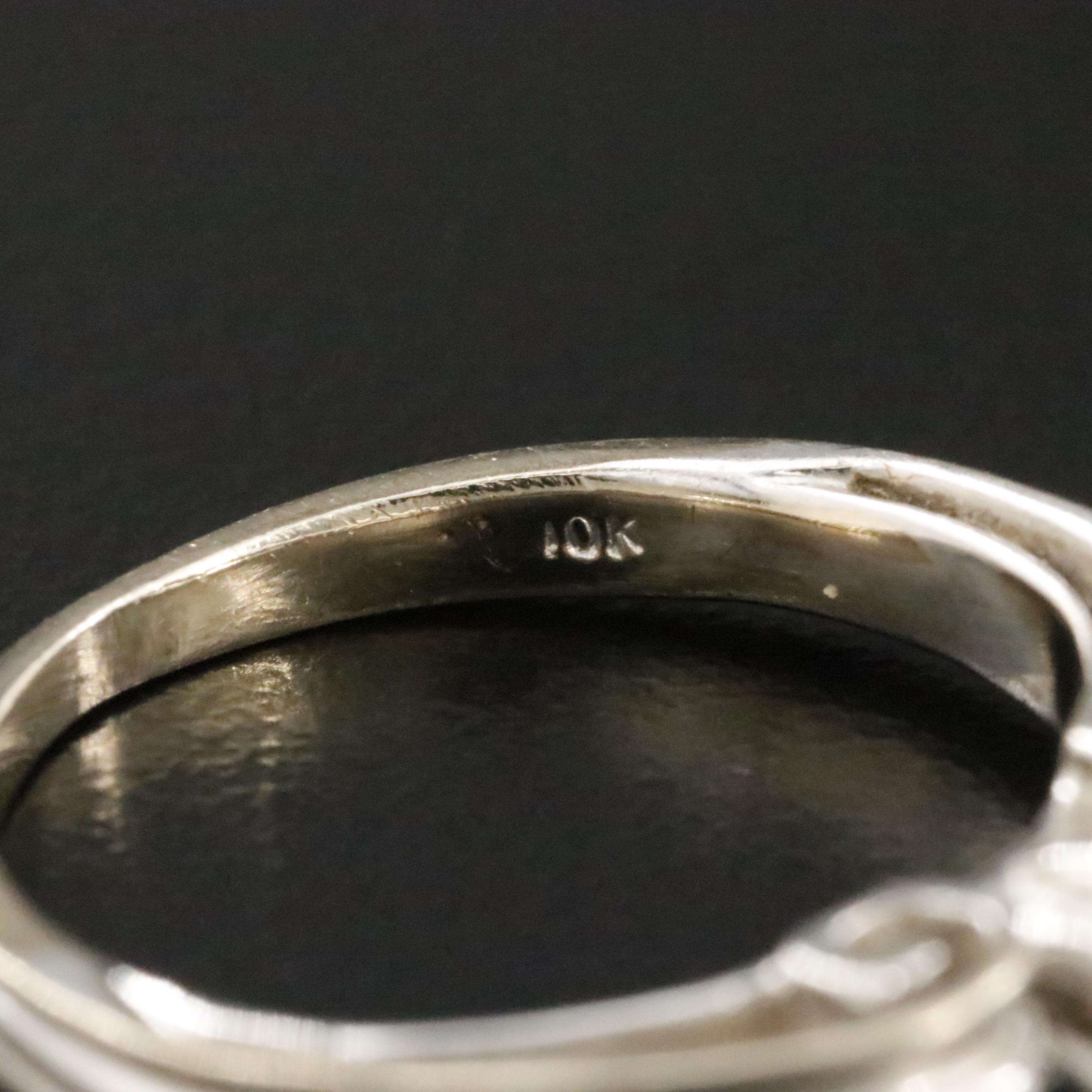 10K 0.15 CT Diamond Ring