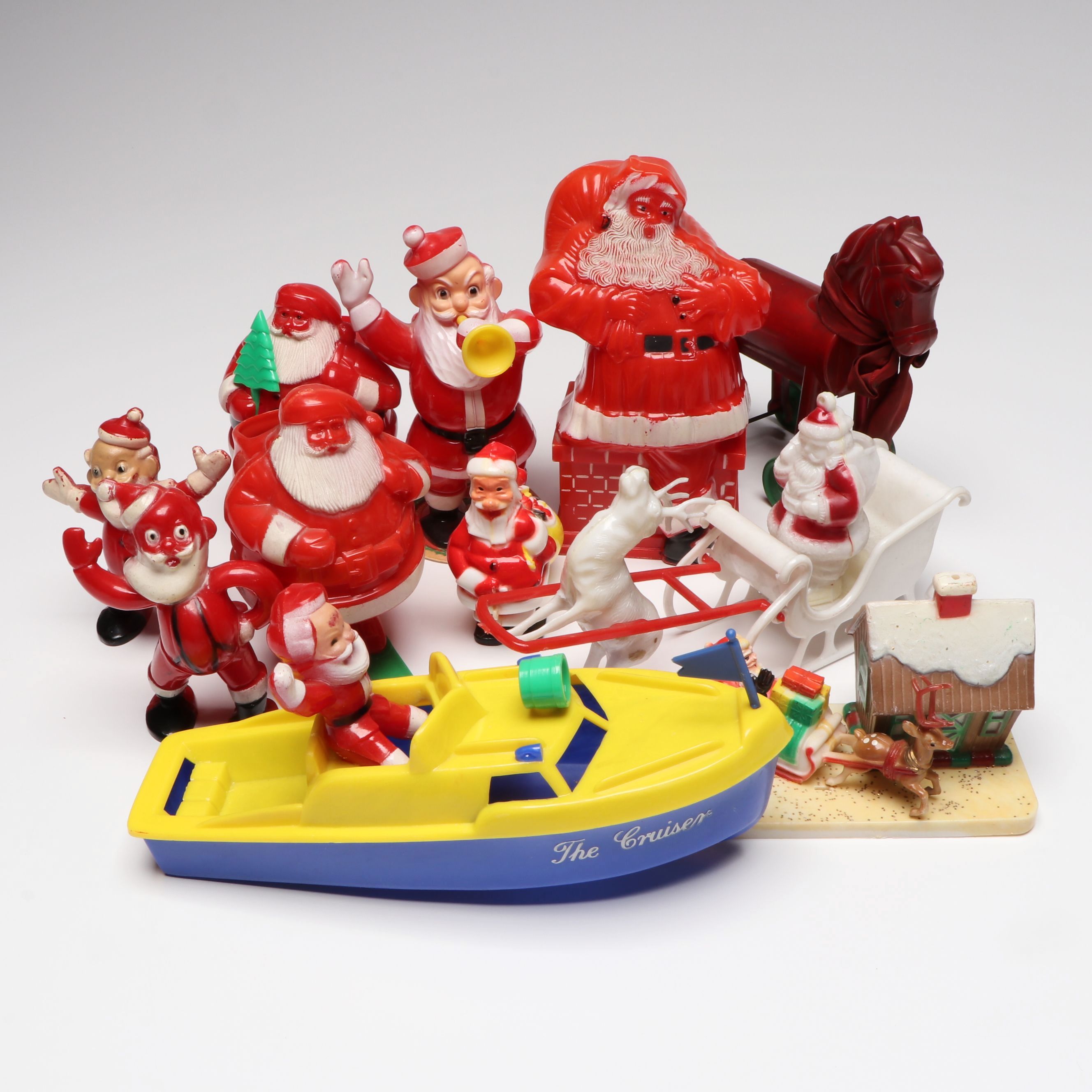 Santa Claus Figure Piggy Bank and Other Christmas Decorations