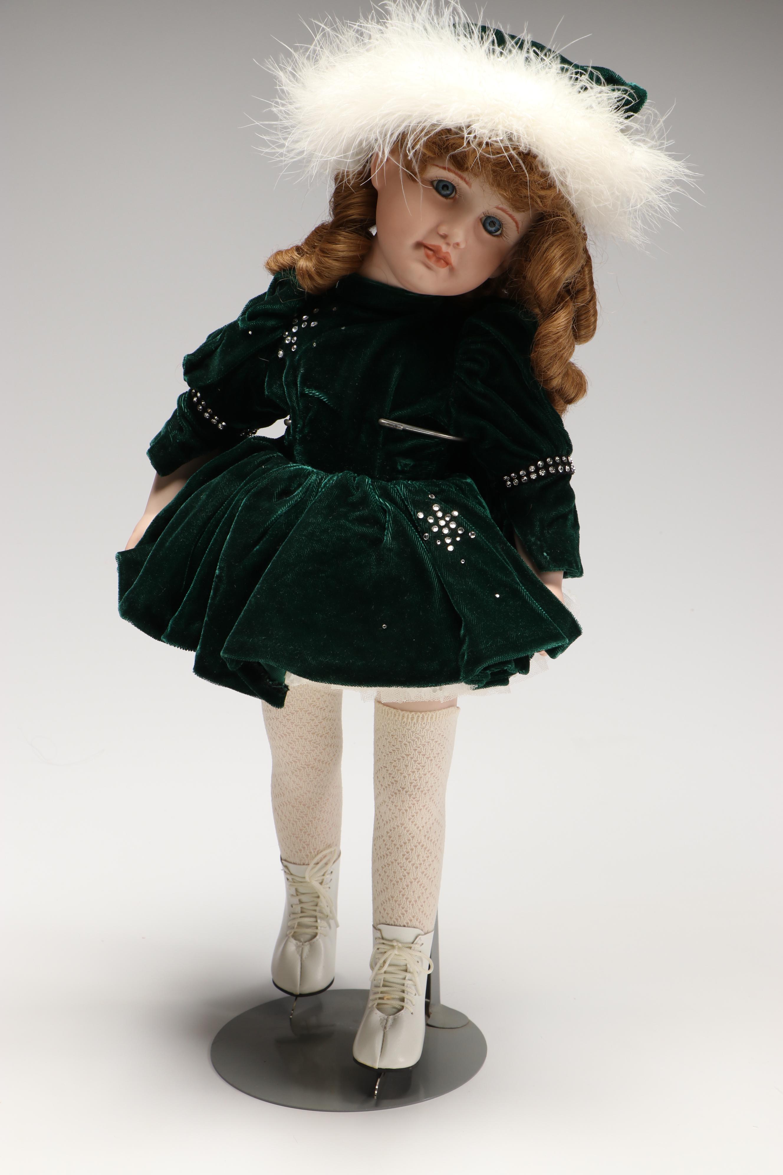 "Dance of the Sugar Plum Fairy" and "Natacha" Porcelain Dolls with Wooden Sled