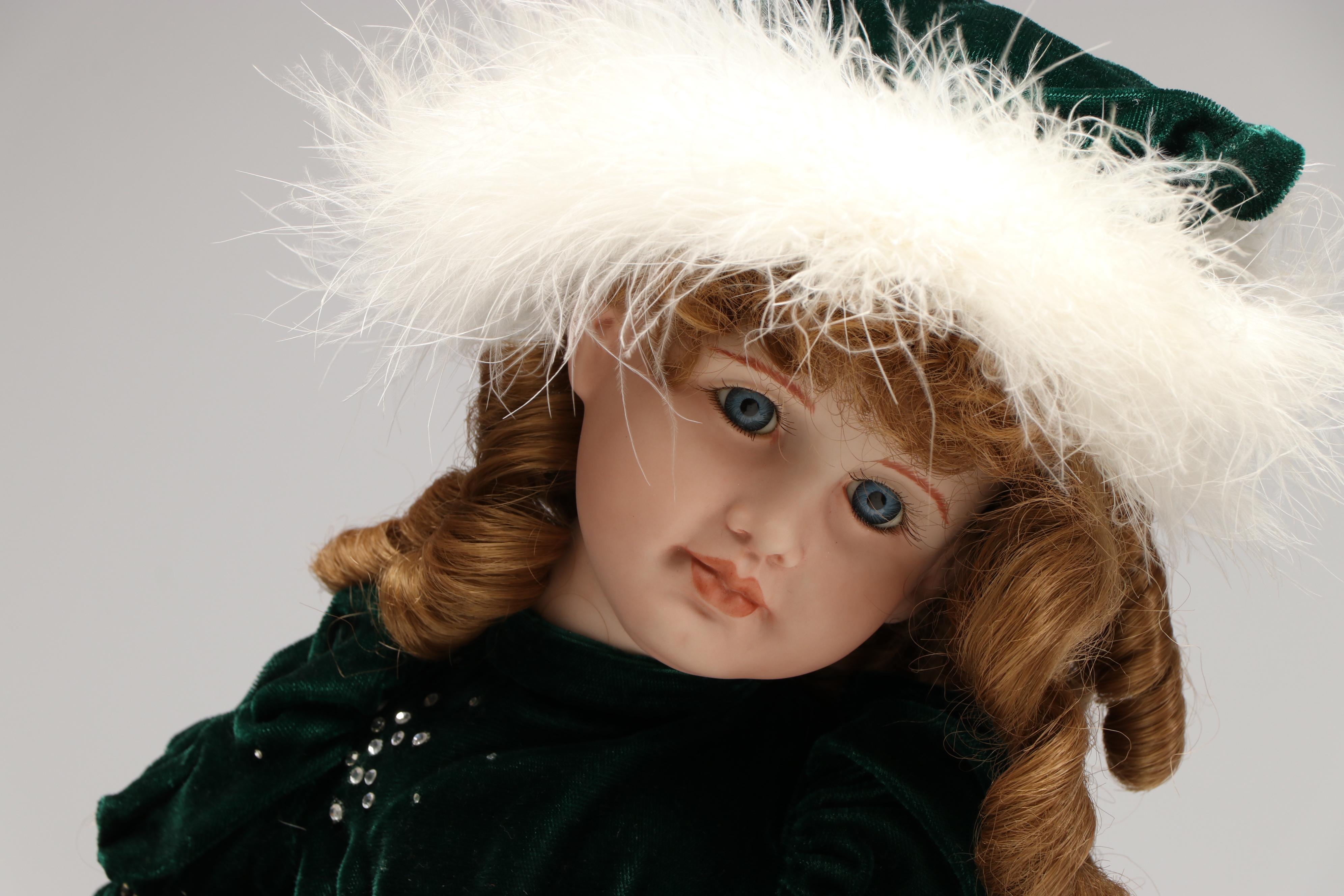 "Dance of the Sugar Plum Fairy" and "Natacha" Porcelain Dolls with Wooden Sled