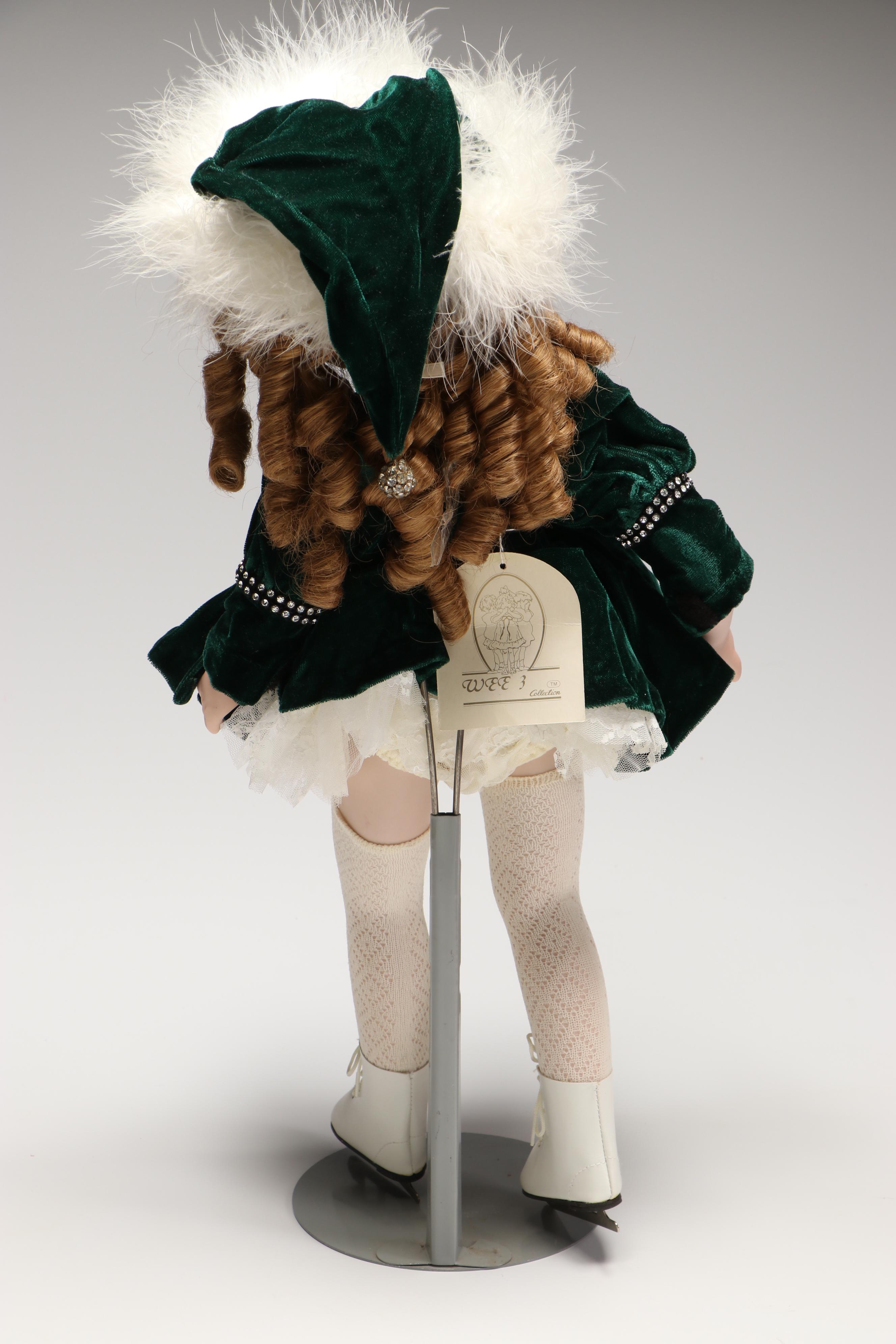 "Dance of the Sugar Plum Fairy" and "Natacha" Porcelain Dolls with Wooden Sled