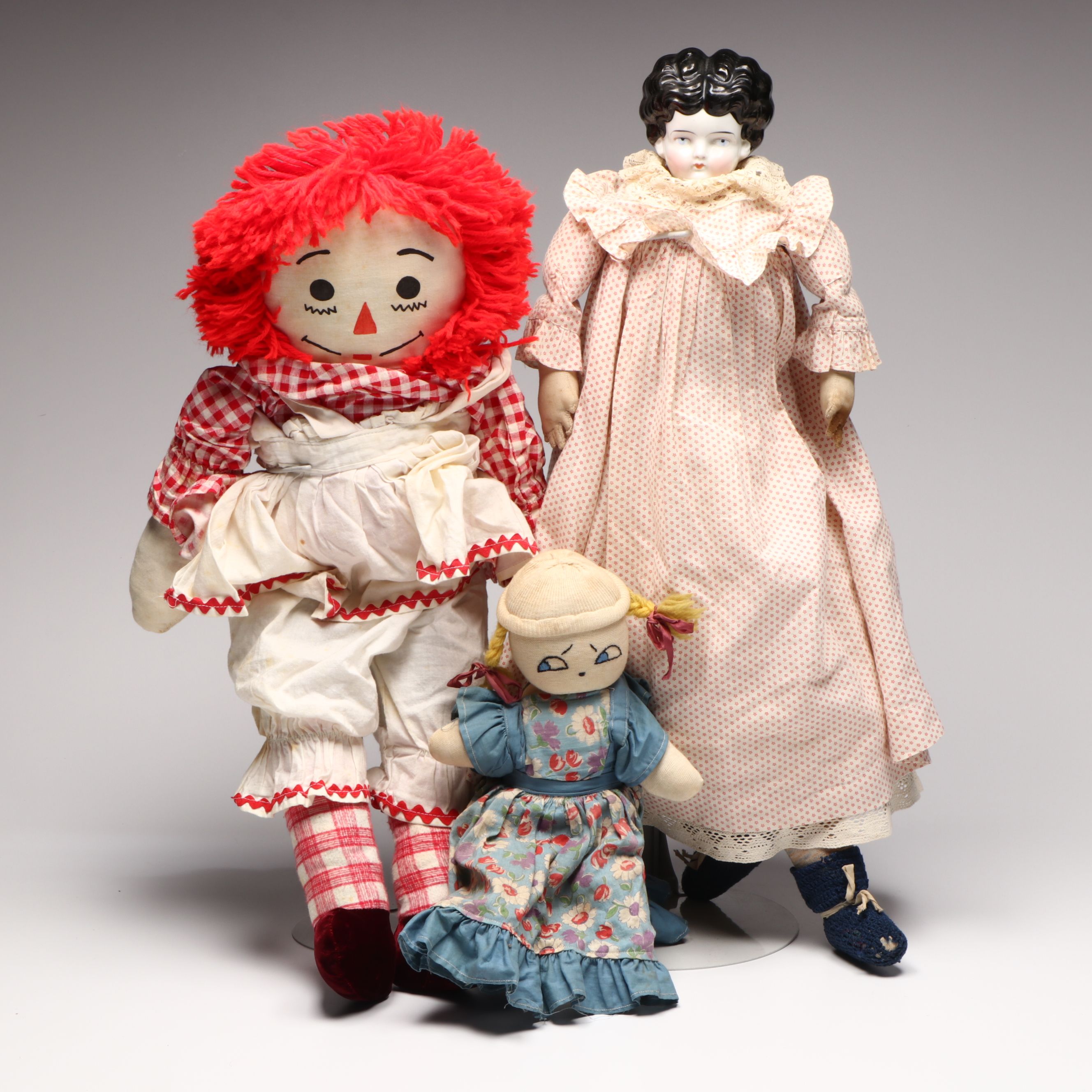 Victorian Style China Head Doll with Raggedy Ann Style and Other Rag Doll