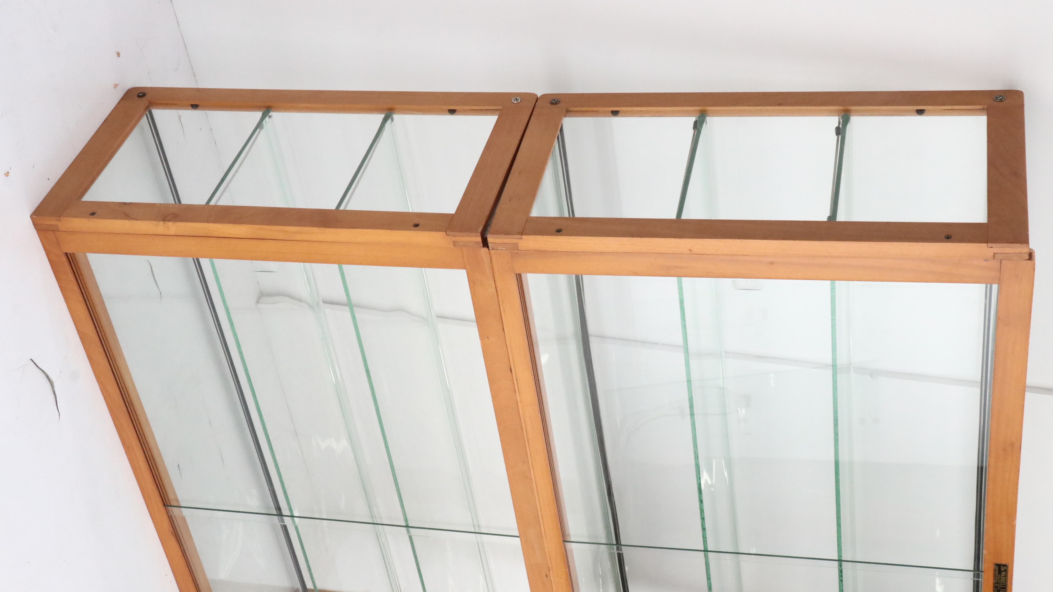 The Waddell Co. Art Deco Style Wood and Glass Display Cabinets