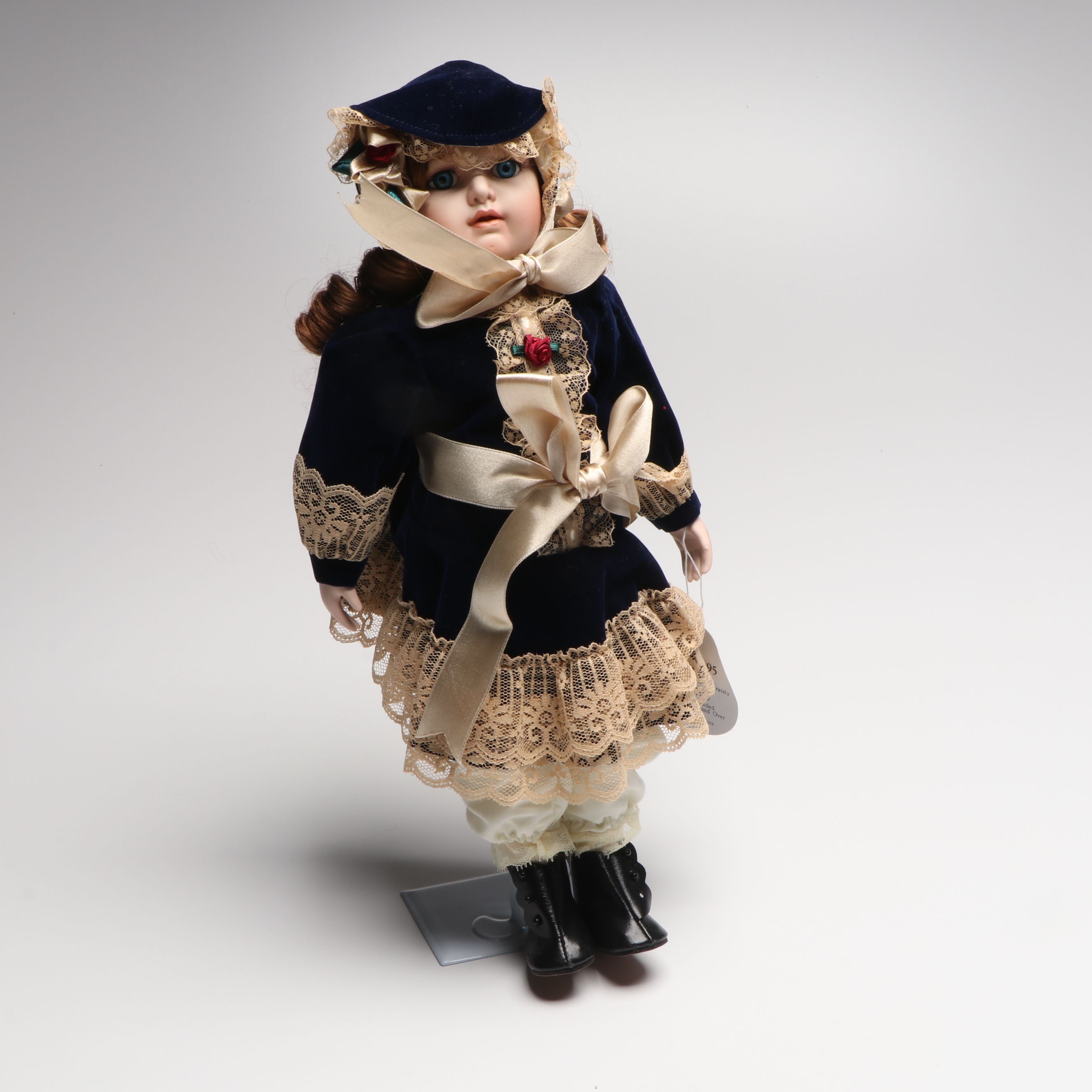Victorian Style Geppeddo and Other Clothed Bisque Dolls