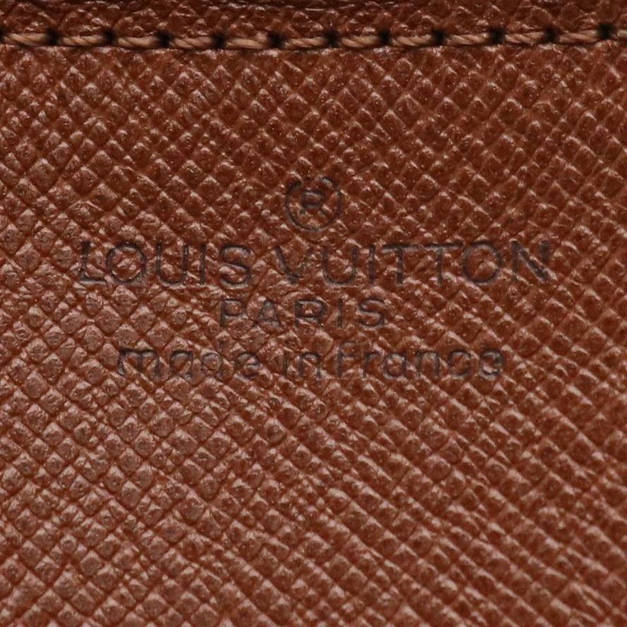 Louis Vuitton Marly Dragonne GM Wristlet in Monogram Canvas and Vachetta Leather