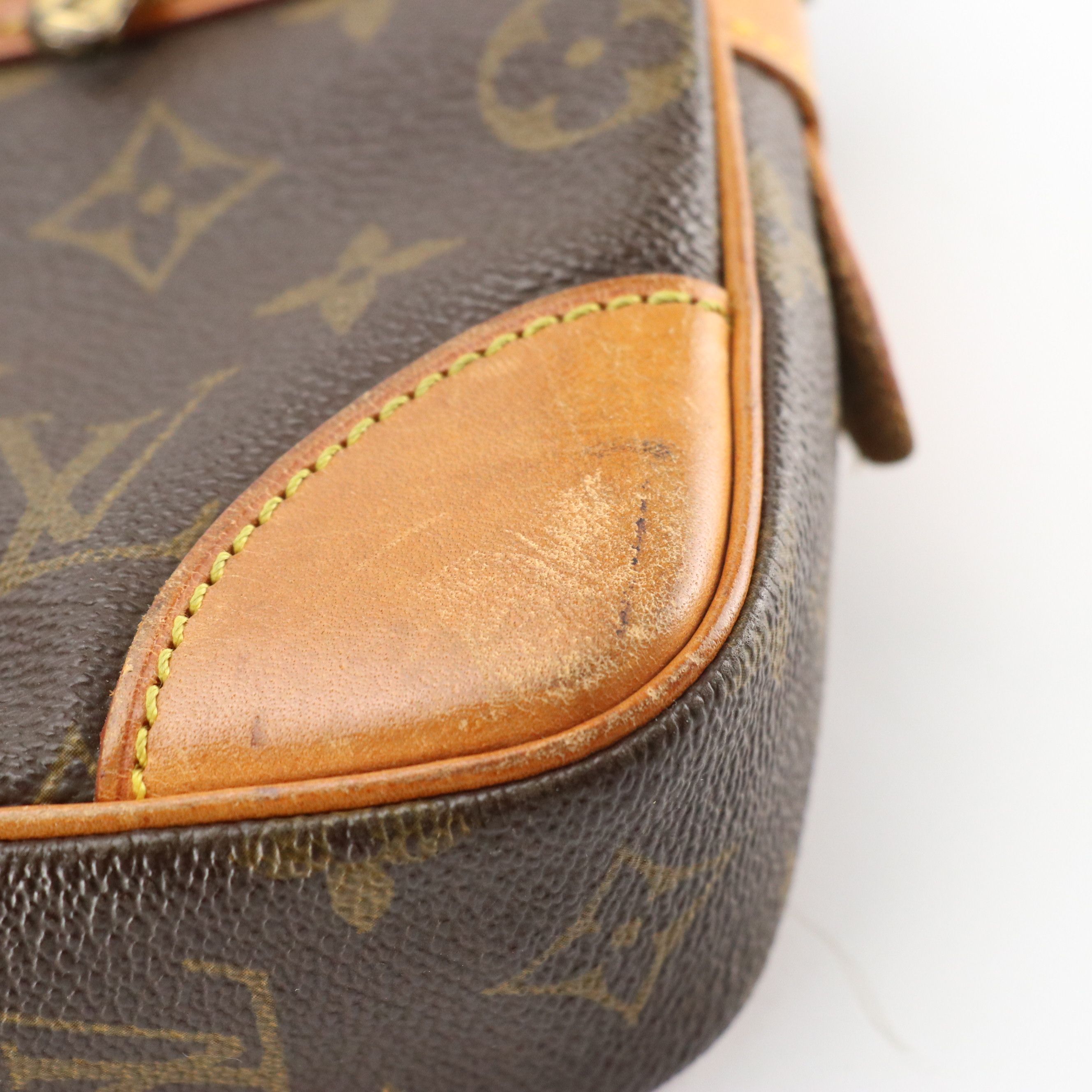 Louis Vuitton Marly Dragonne GM Wristlet in Monogram Canvas and Vachetta Leather