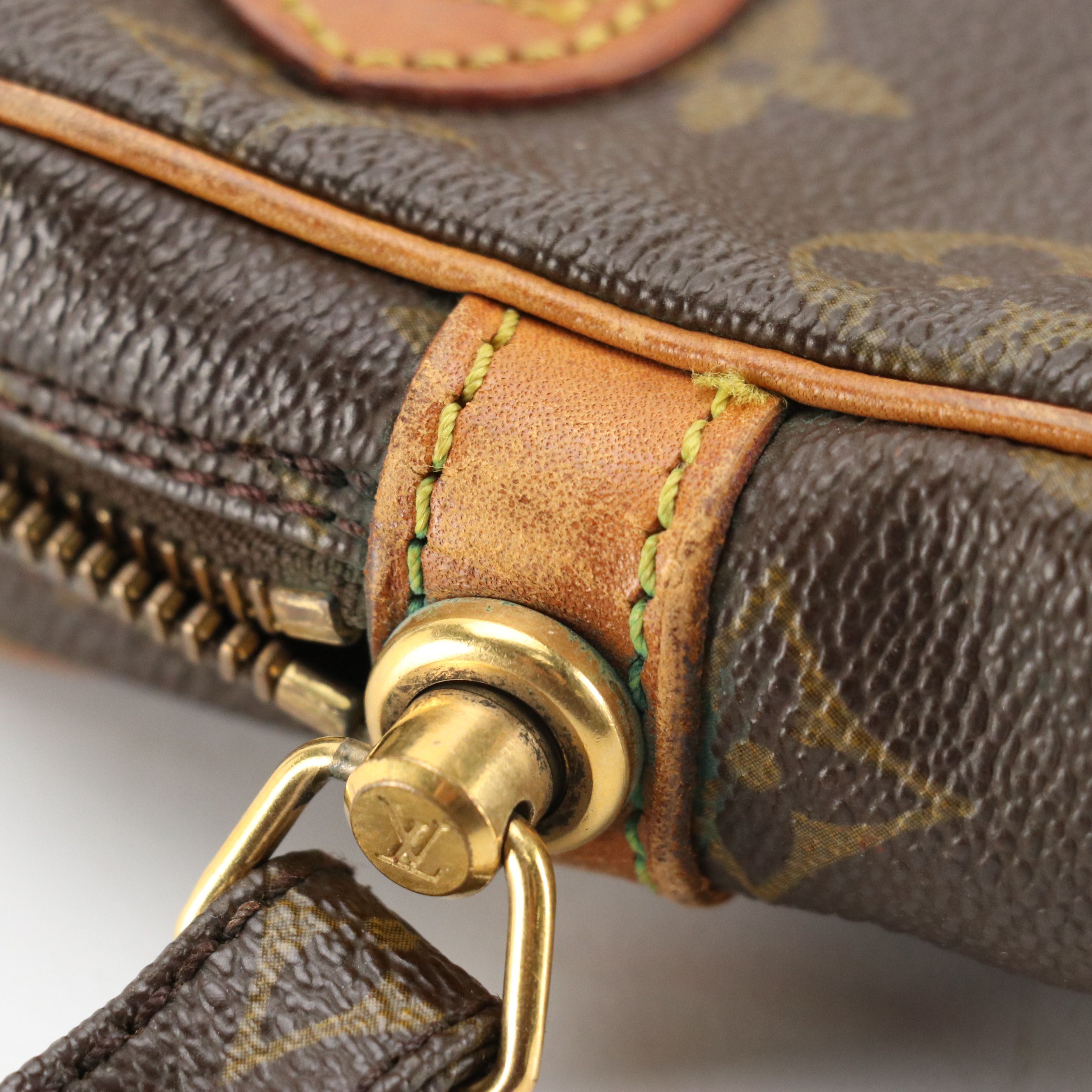 Louis Vuitton Marly Dragonne GM Wristlet in Monogram Canvas and Vachetta Leather