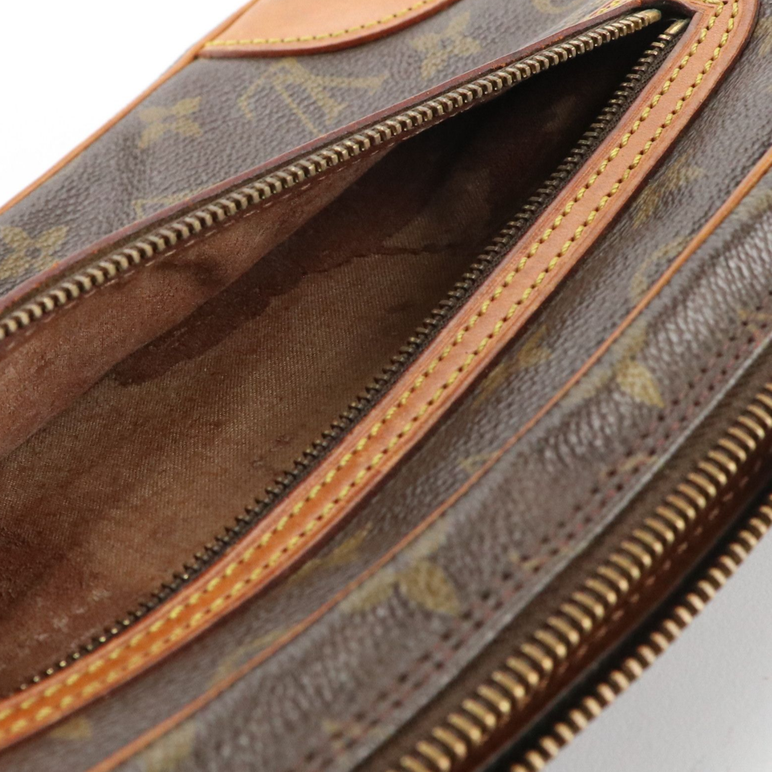 Louis Vuitton Marly Dragonne GM Wristlet in Monogram Canvas and Vachetta Leather