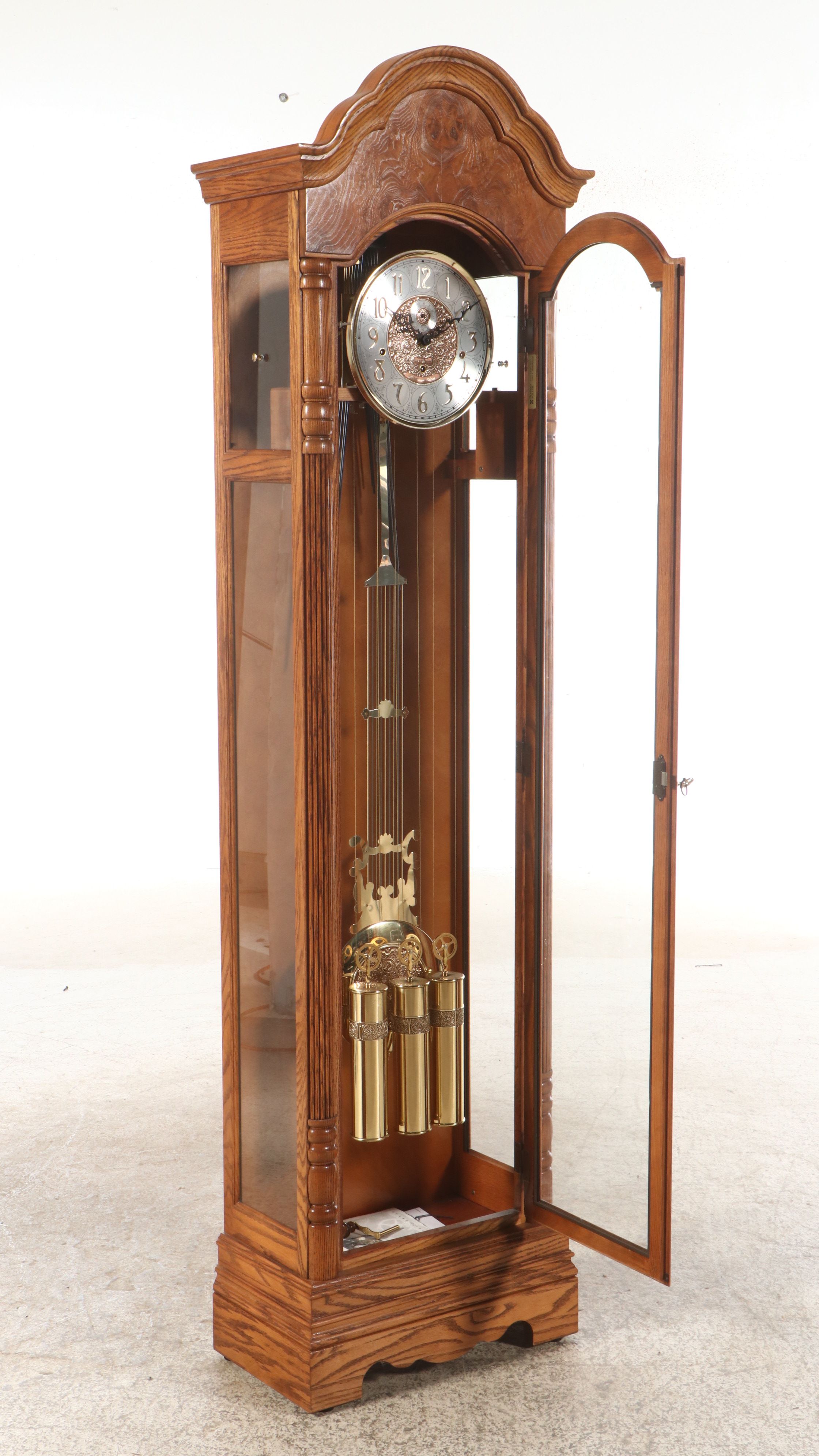 Howard Miller Oak and Burl Grandfather Clock