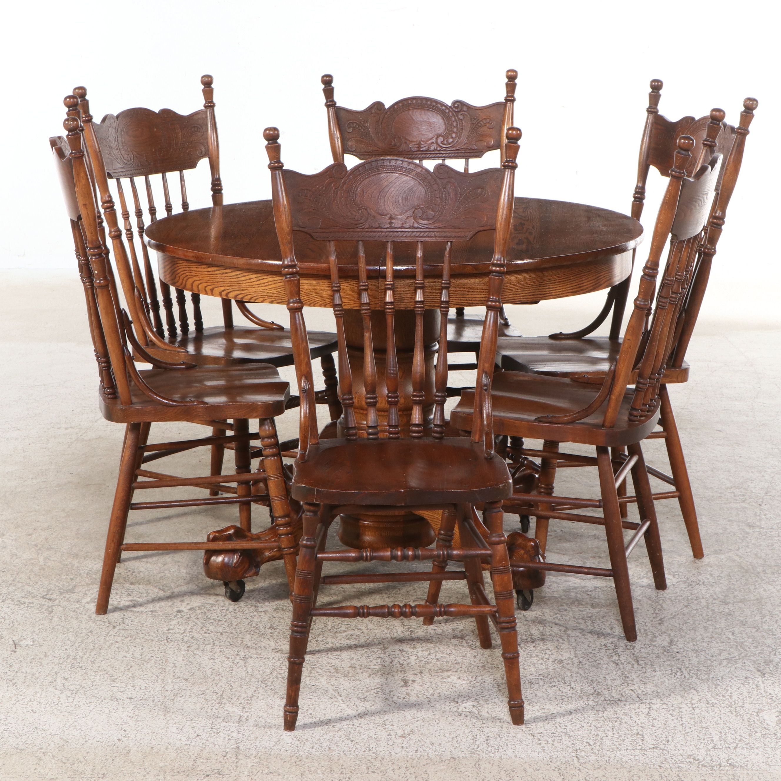 Seven Piece Victorian Style Oak Dining Set with Pressed Wood Chairs