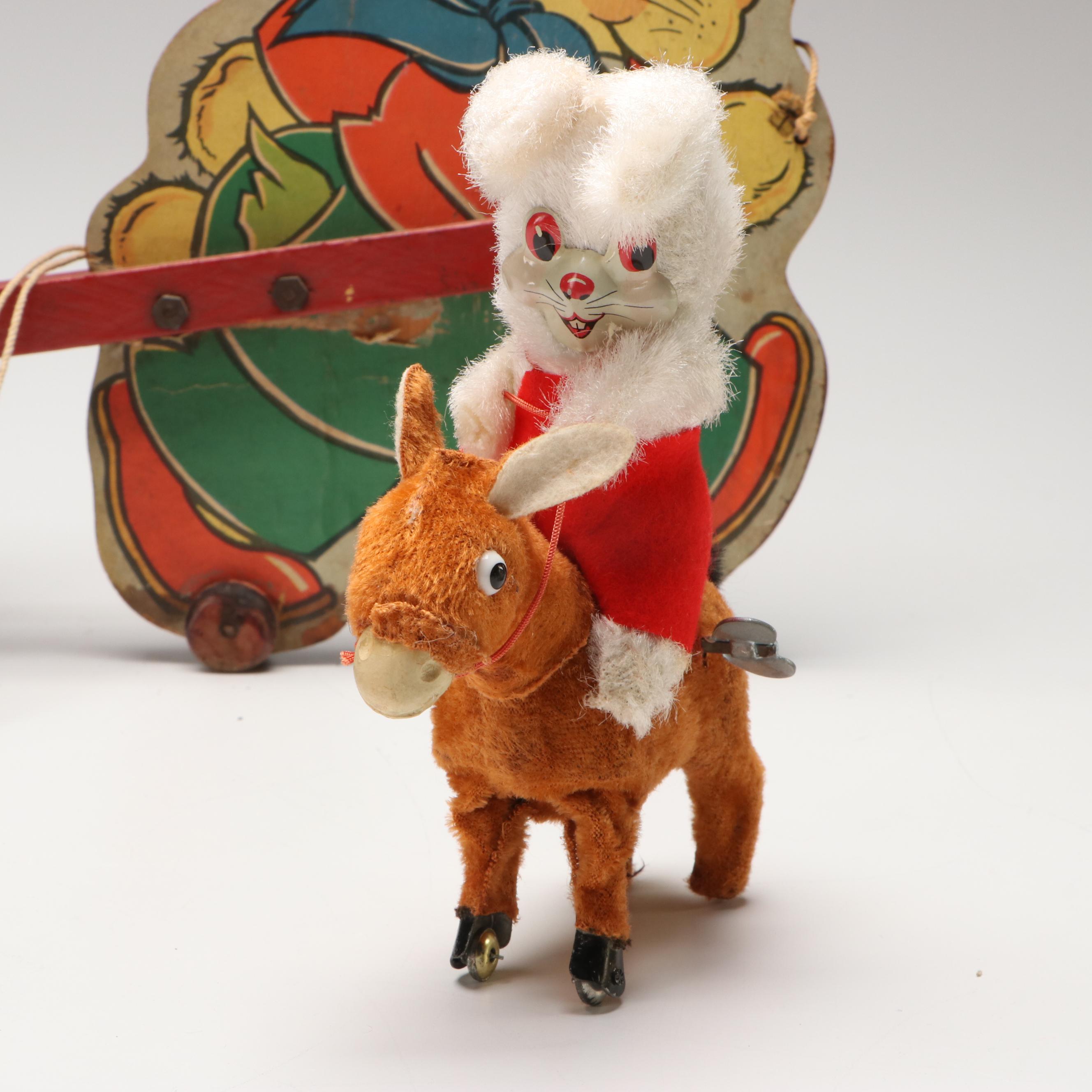 Bunny Jockey Wind-Up Toy with Other Easter Décor and Collectibles