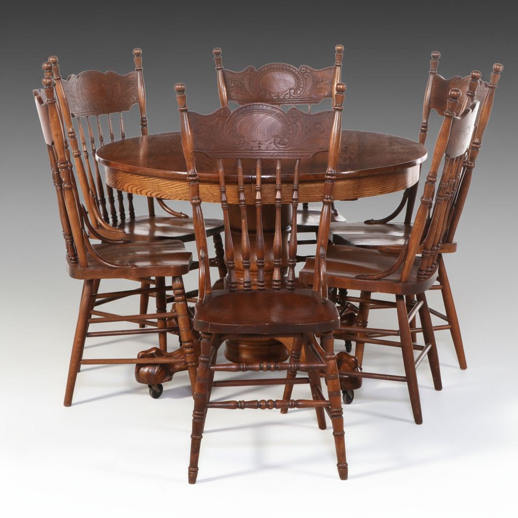 Seven Piece Victorian Style Oak Dining Set with Pressed Wood Chairs