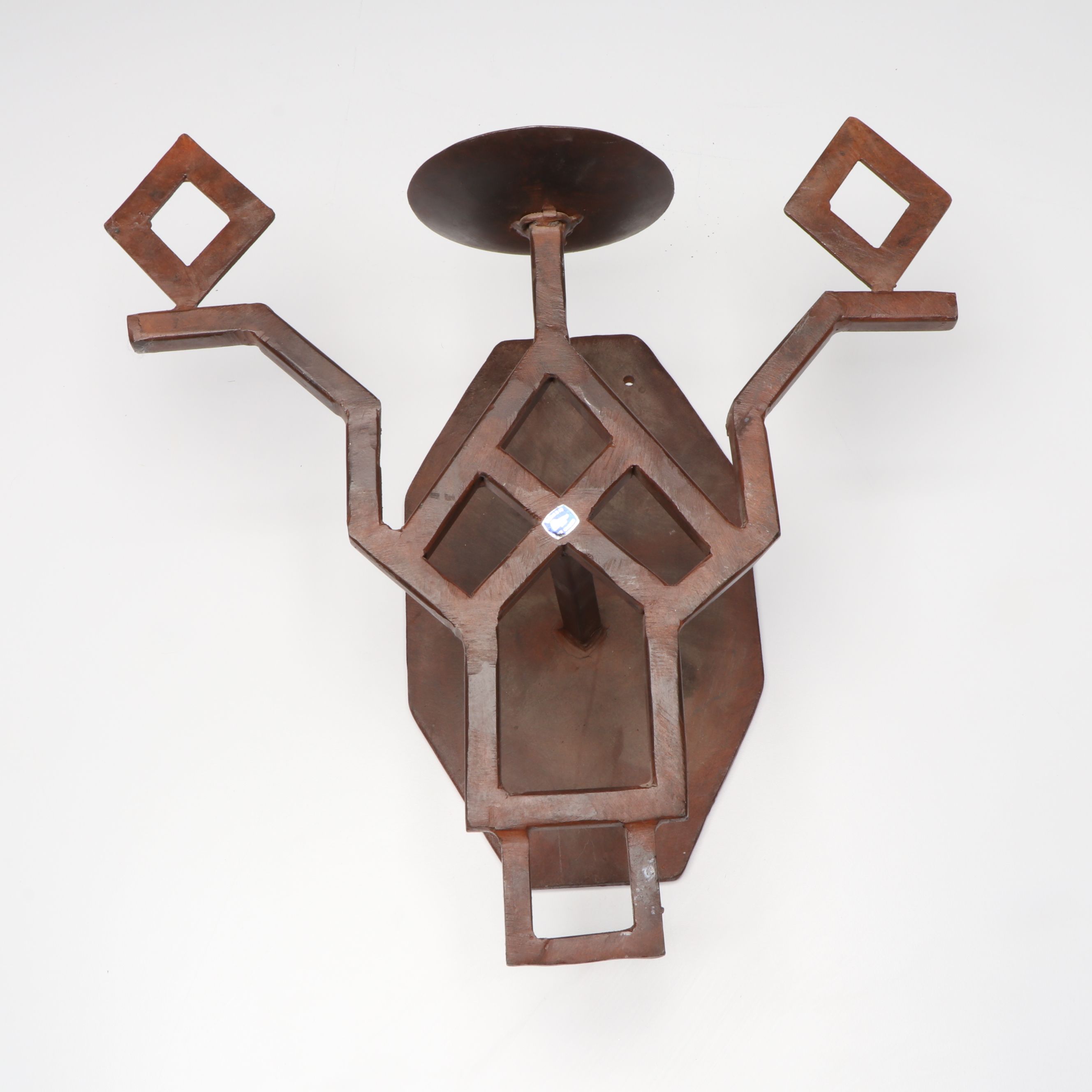 Southwest Style Patinated Metal Sconces