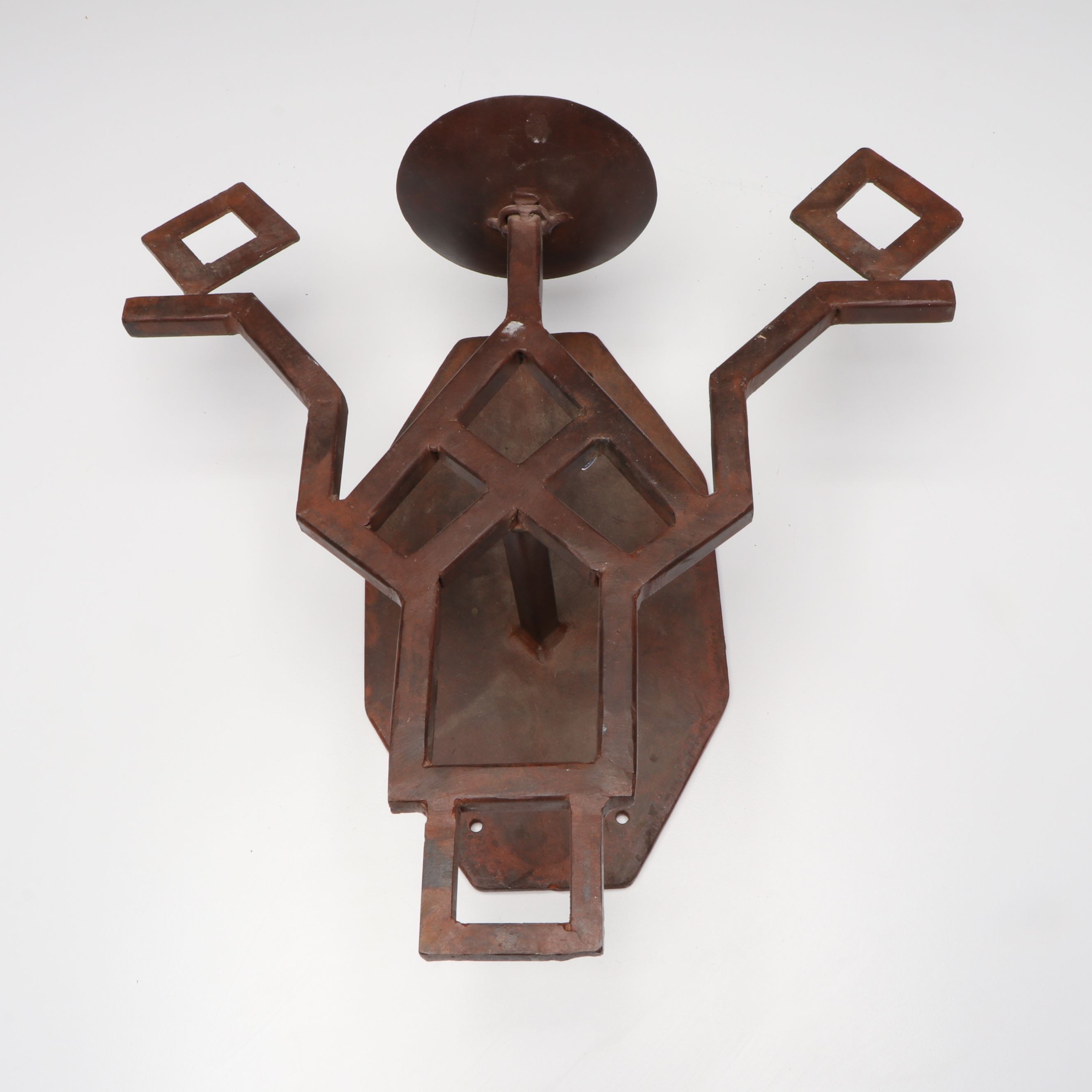 Southwest Style Patinated Metal Sconces