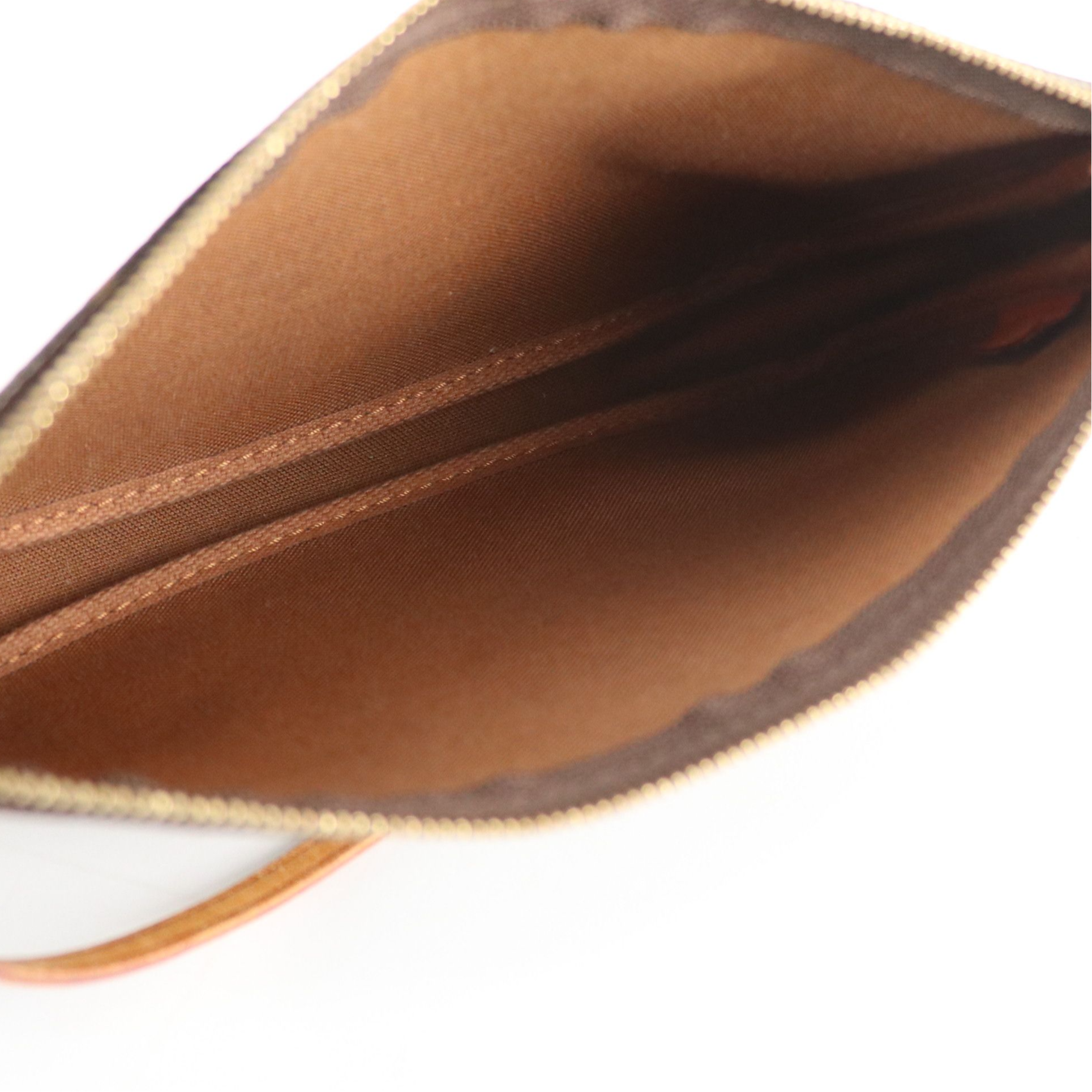 Louis Vuitton Zip Pochette in Monogram Canvas and Vachetta Leather Trim