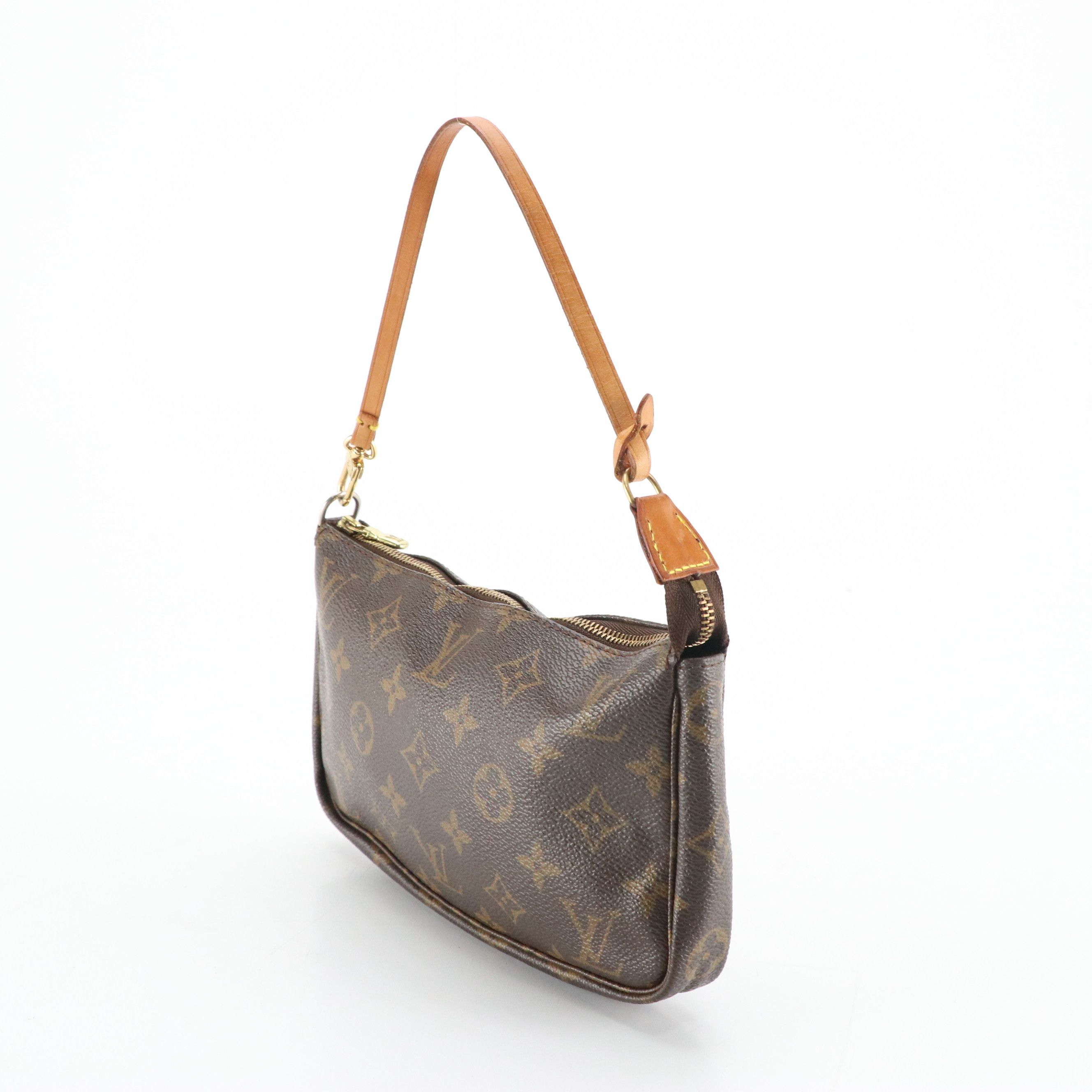 Louis Vuitton Zip Pochette in Monogram Canvas and Vachetta Leather Trim