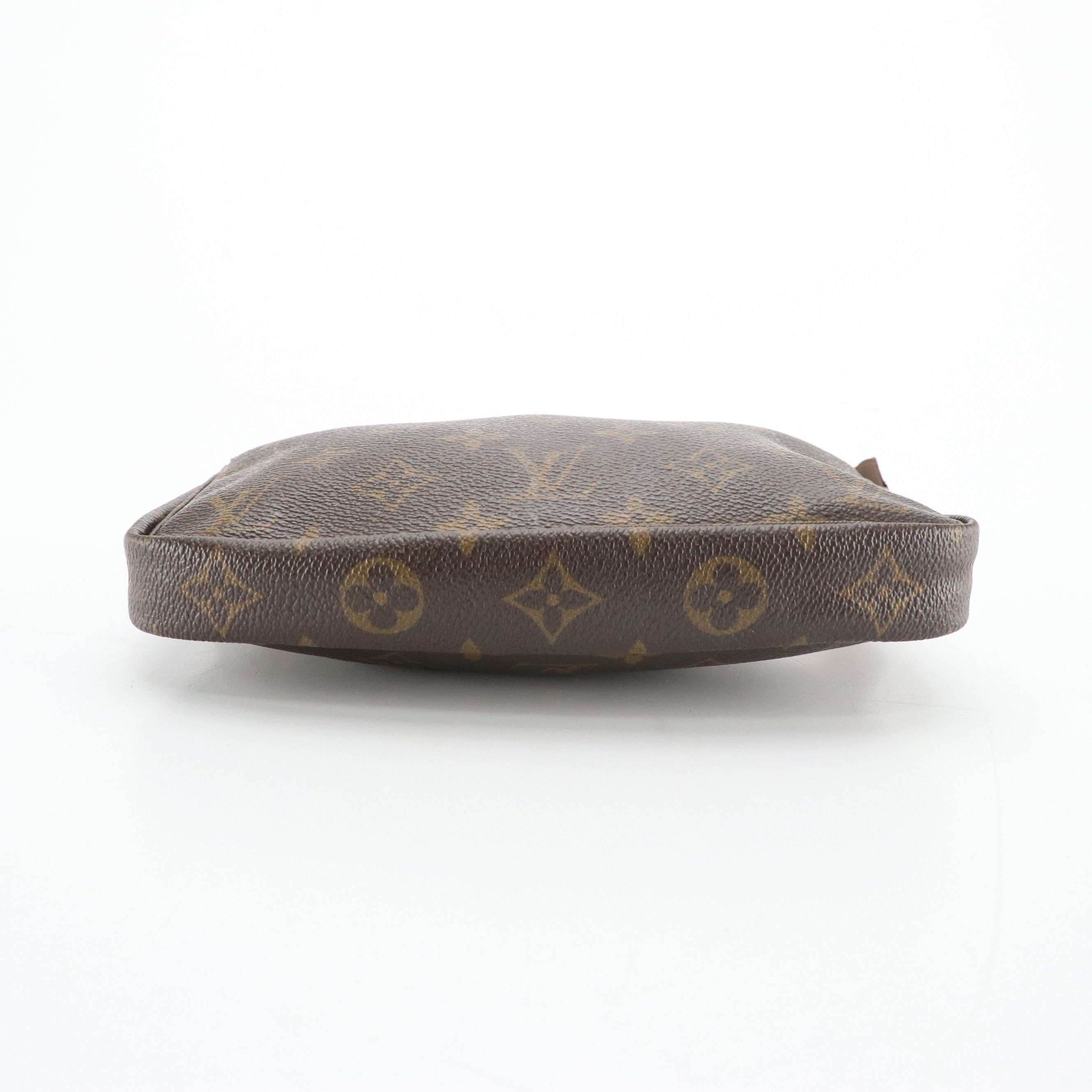 Louis Vuitton Zip Pochette in Monogram Canvas and Vachetta Leather Trim