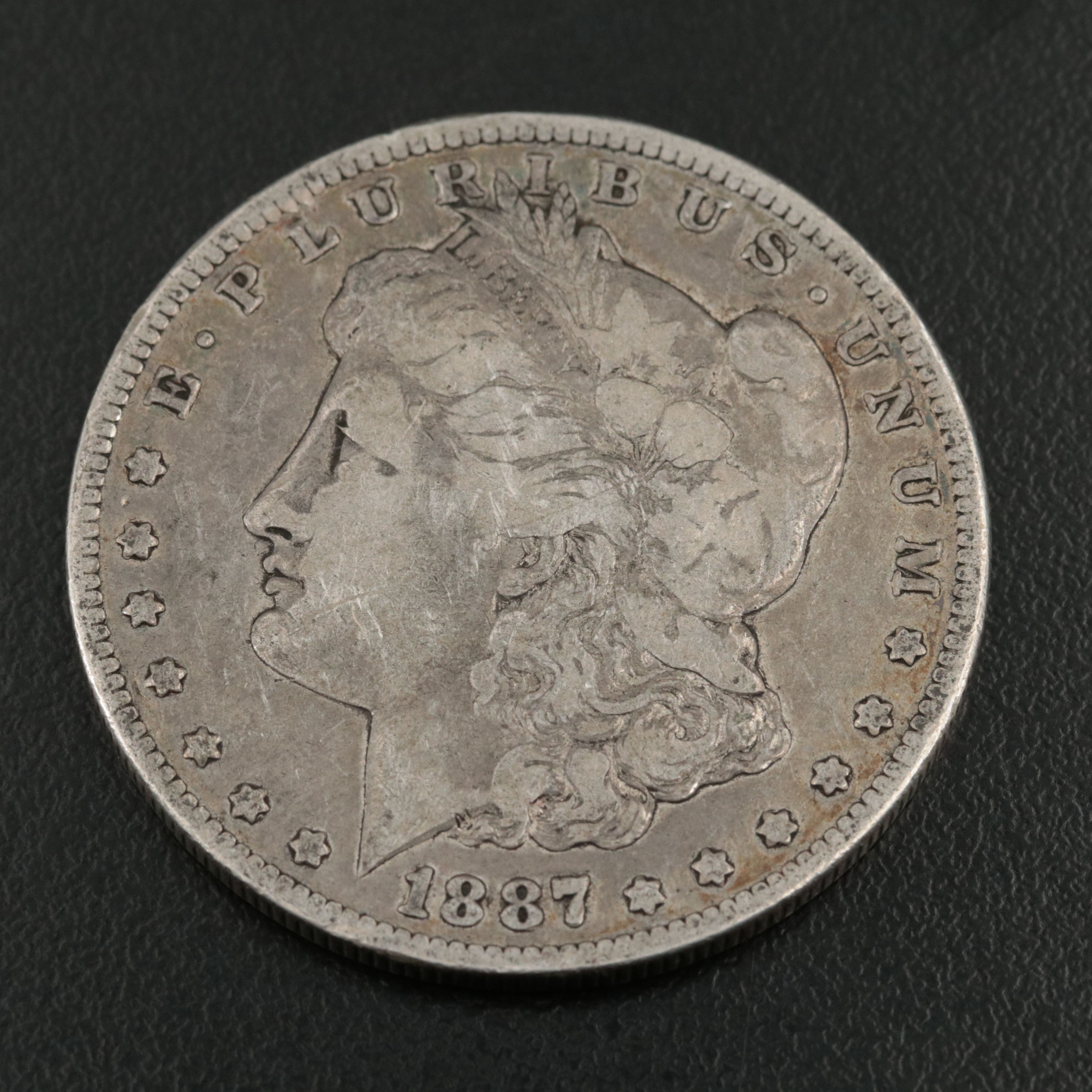 Three Morgan Silver Dollars, 1887 to 1889