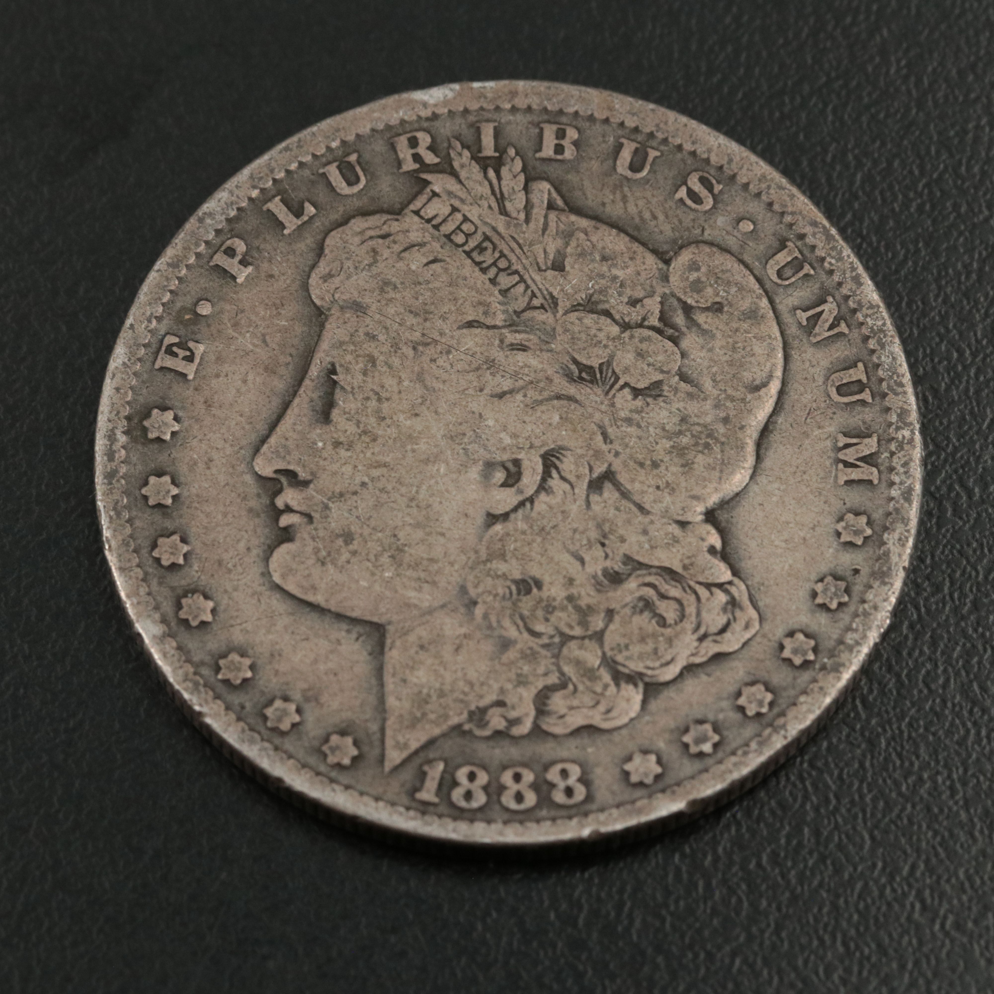 Three Morgan Silver Dollars, 1887 to 1889