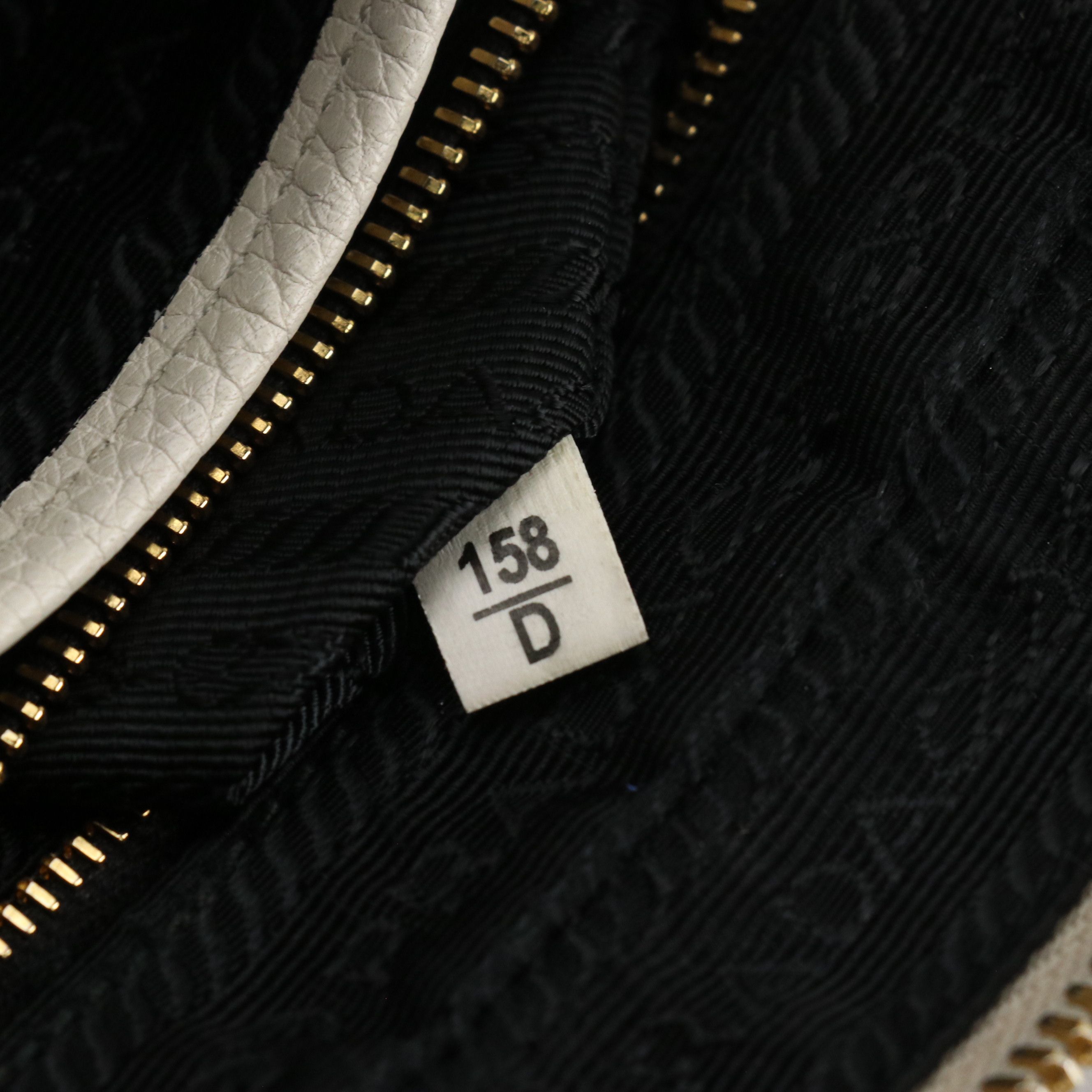 Prada Zip-Around Crossbody Bag in Ivory Grained Calfskin Leather