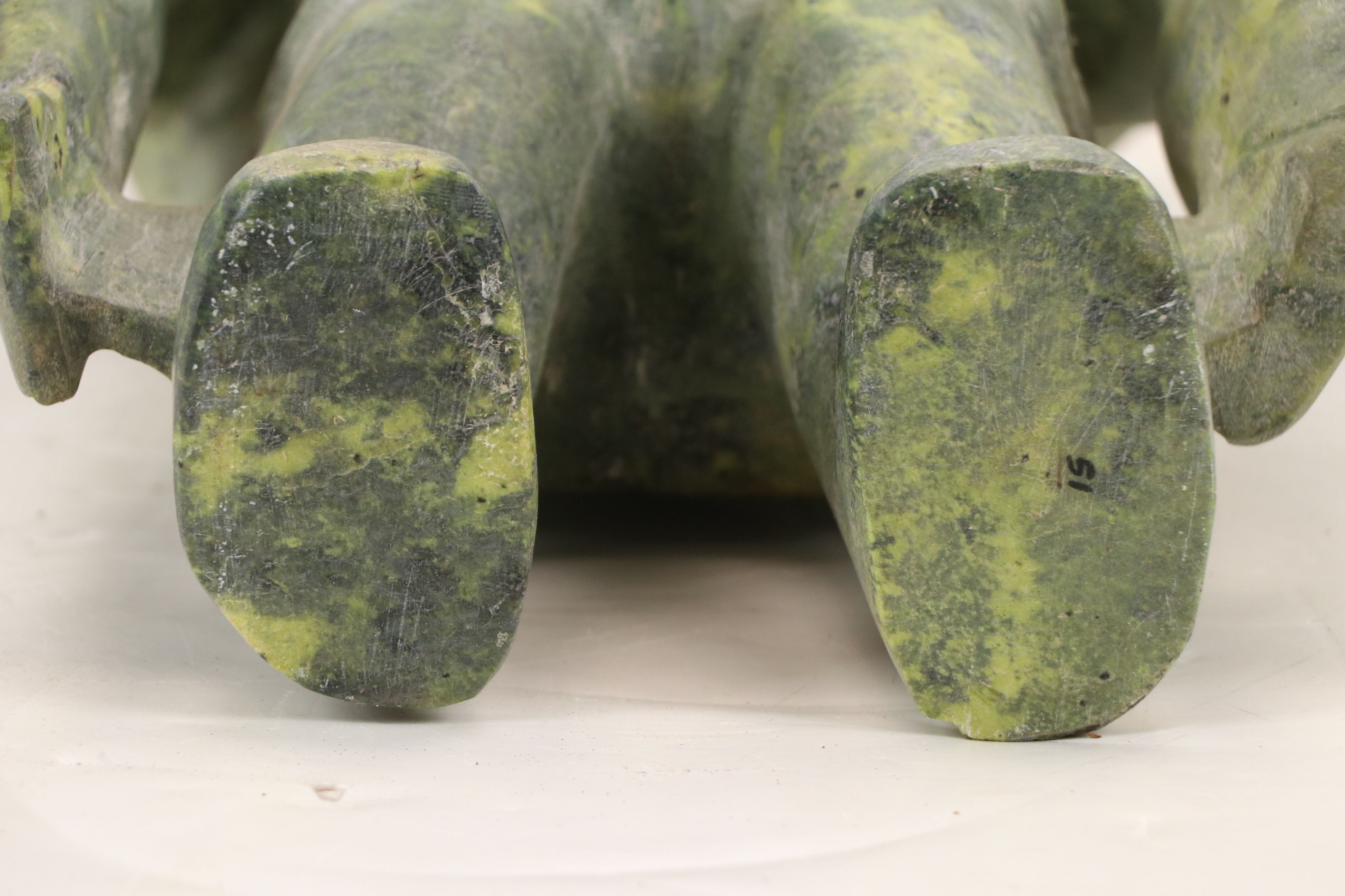 Carved Serpentine Sculpture of Inuit Hunter with Fish, Mid-20th Century