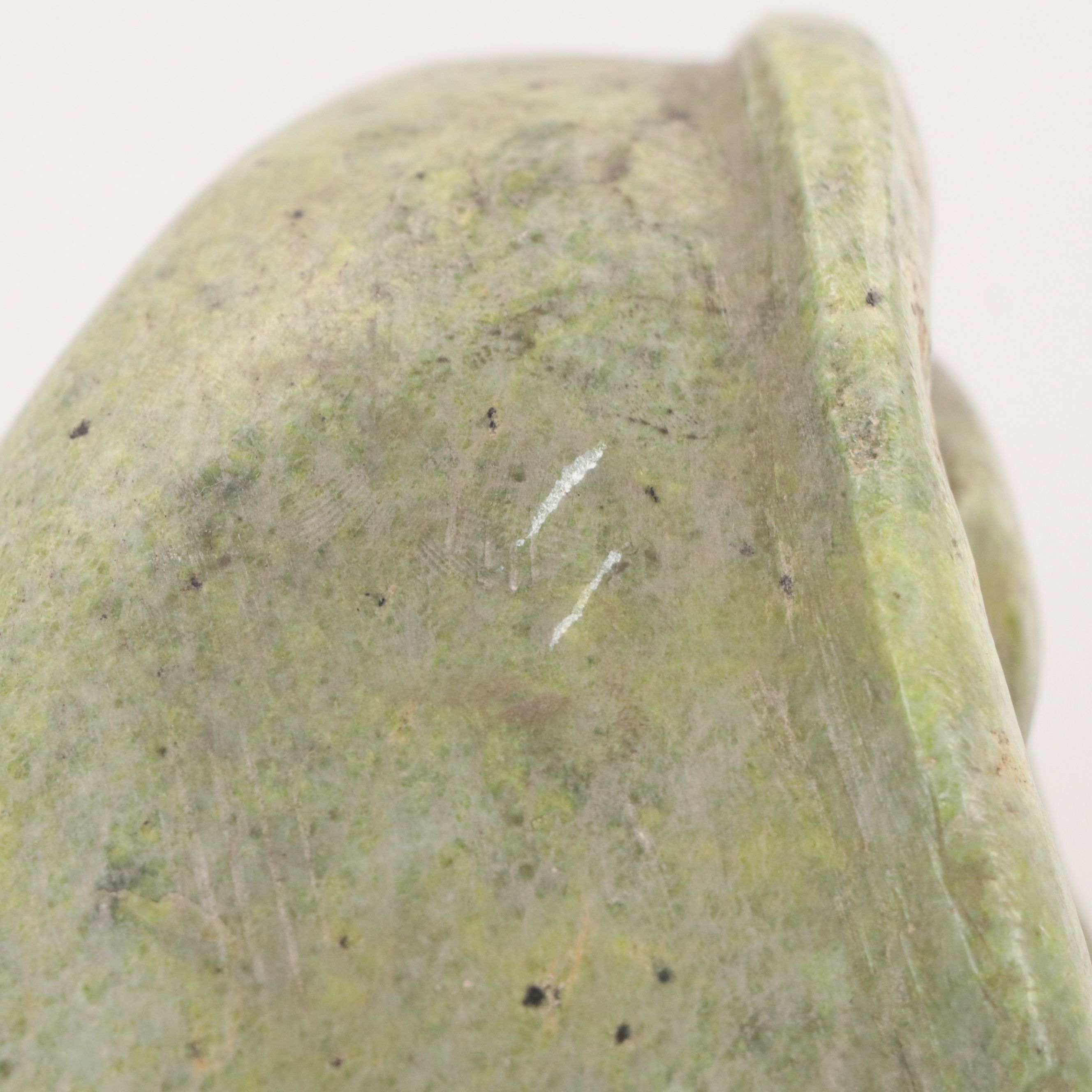 Carved Serpentine Sculpture of Inuit Hunter with Fish, Mid-20th Century