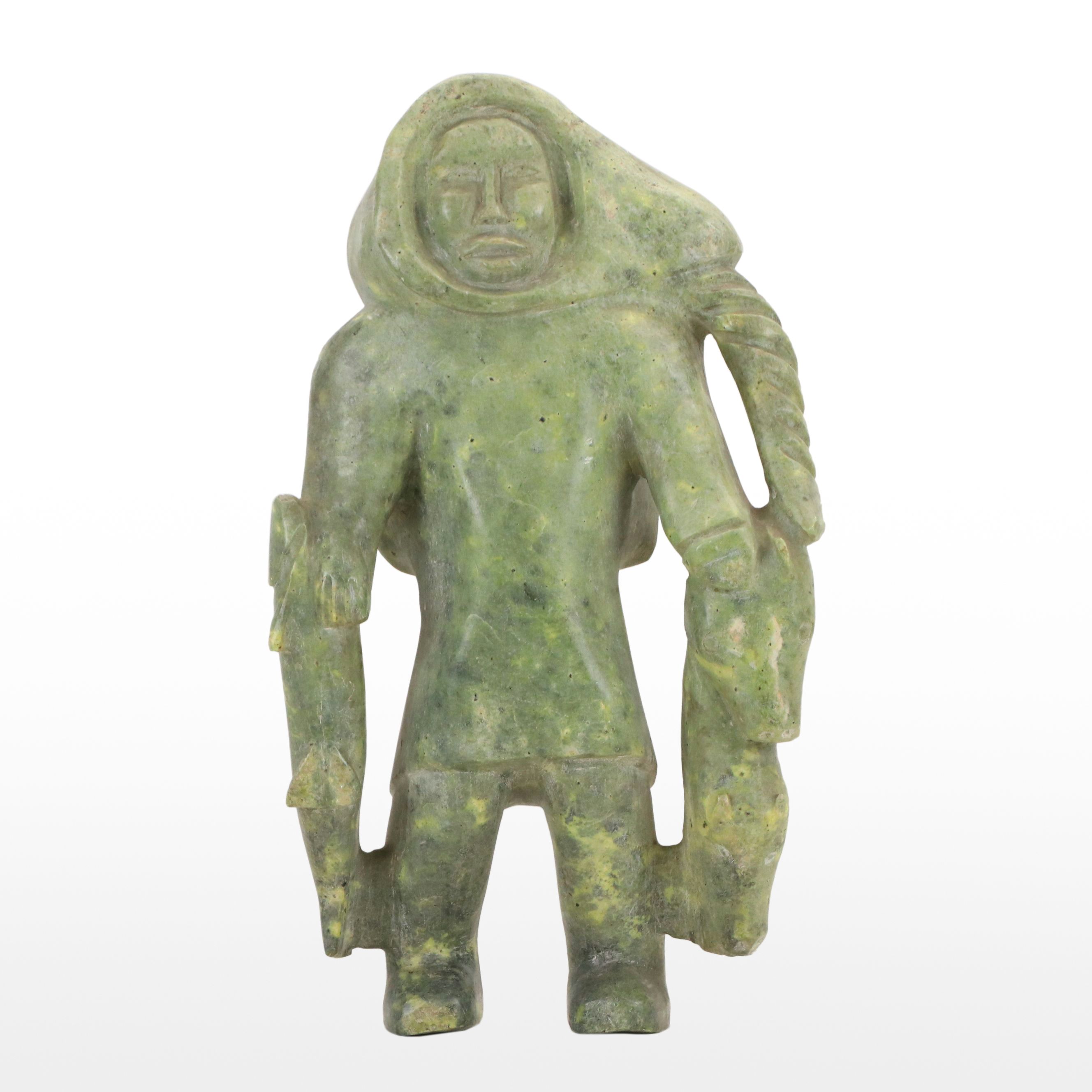 Carved Serpentine Sculpture of Inuit Hunter with Fish, Mid-20th Century