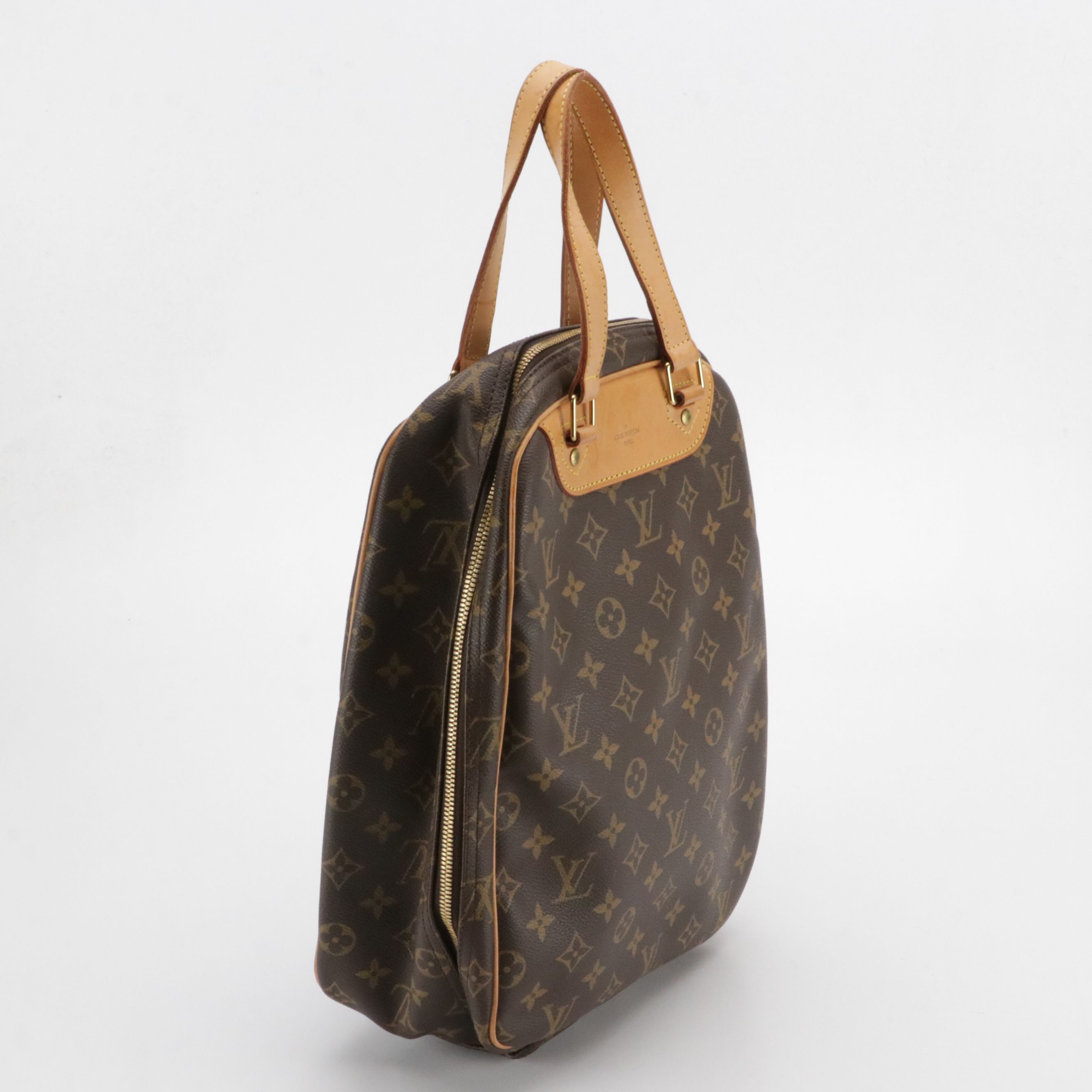 Louis Vuitton Excursion Shoe Bag in Monogram Canvas and Vachetta Leather