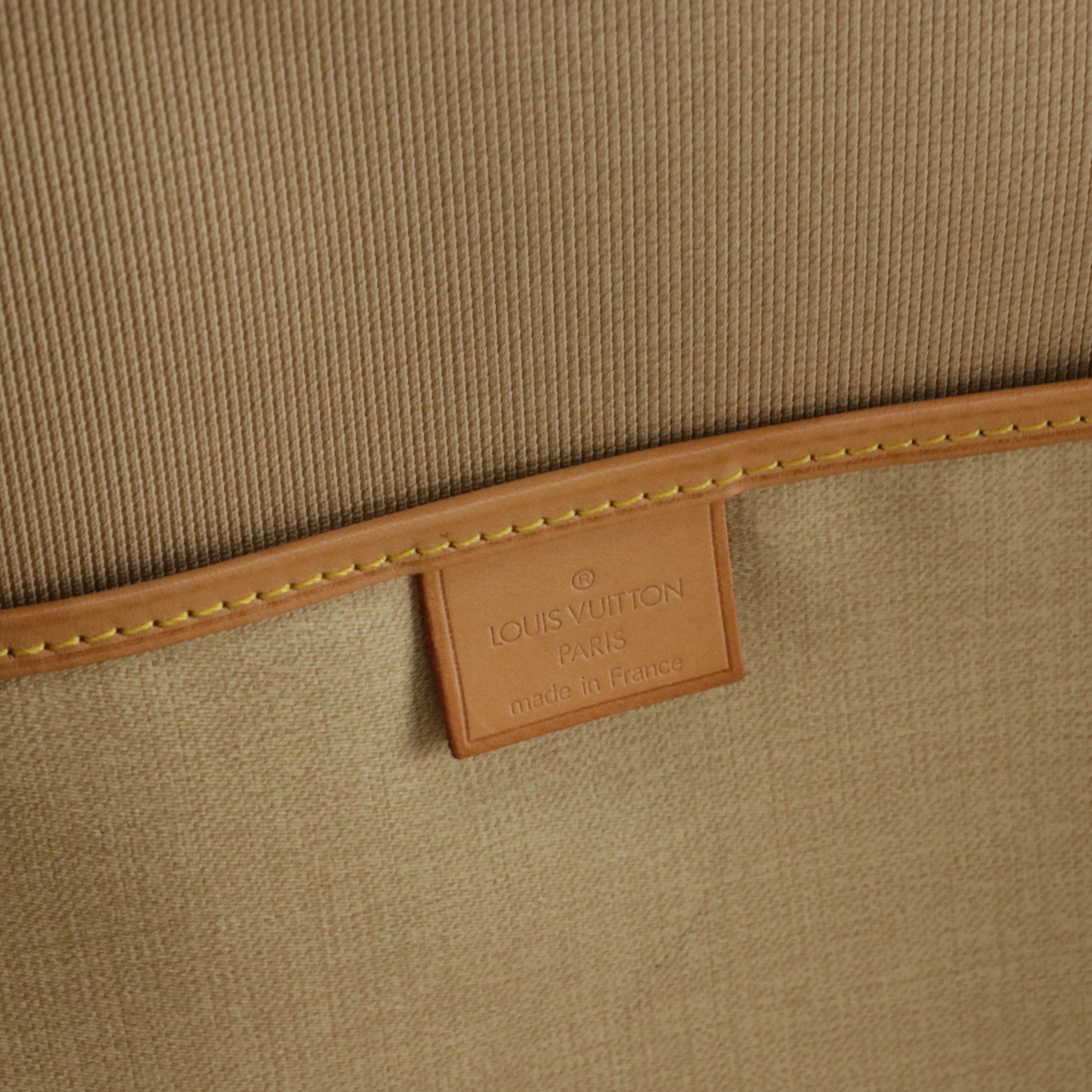 Louis Vuitton Excursion Shoe Bag in Monogram Canvas and Vachetta Leather