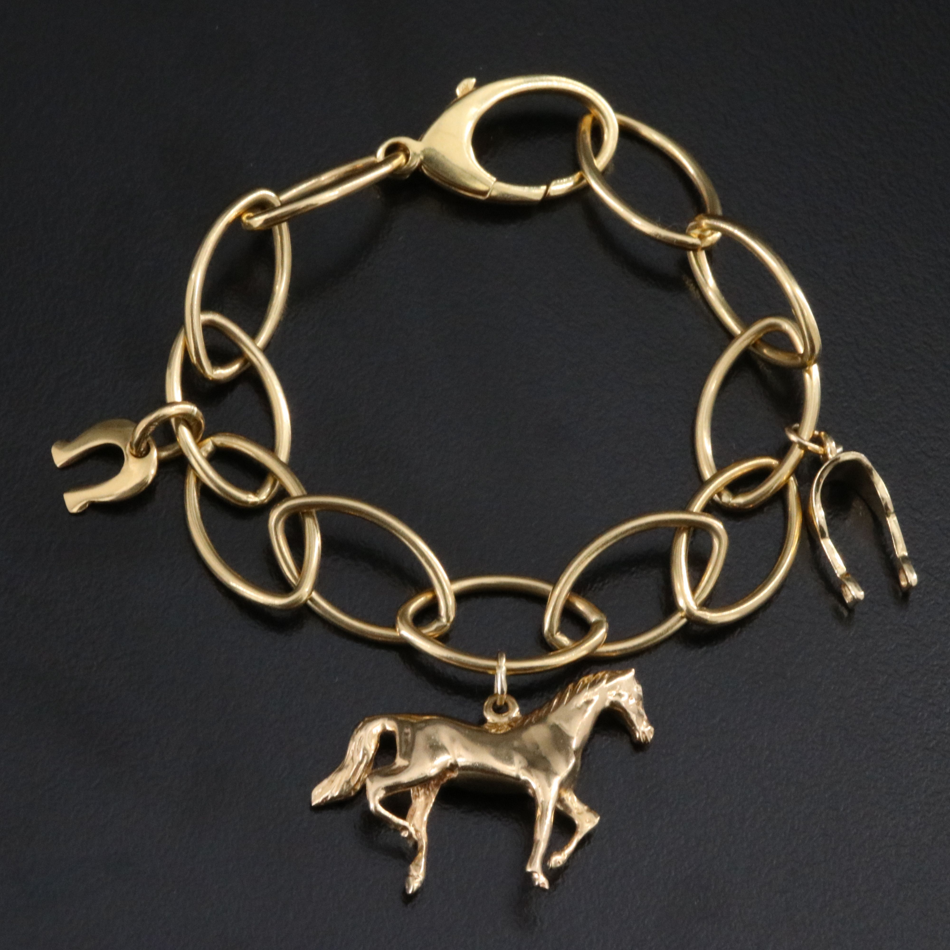 Tiffany & Co. 18K Oval Link Bracelet with Equestrian Themed Charms