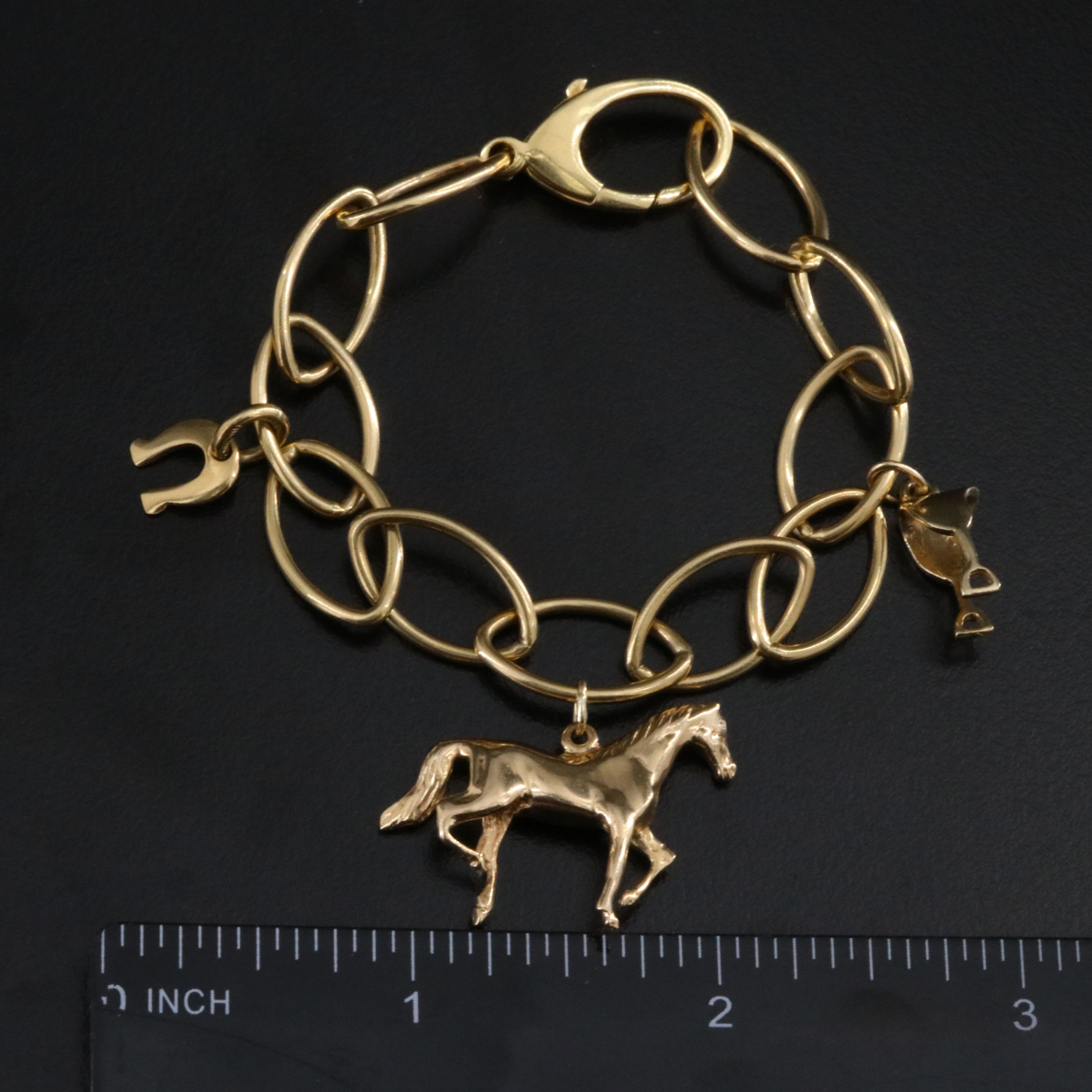 Tiffany & Co. 18K Oval Link Bracelet with Equestrian Themed Charms