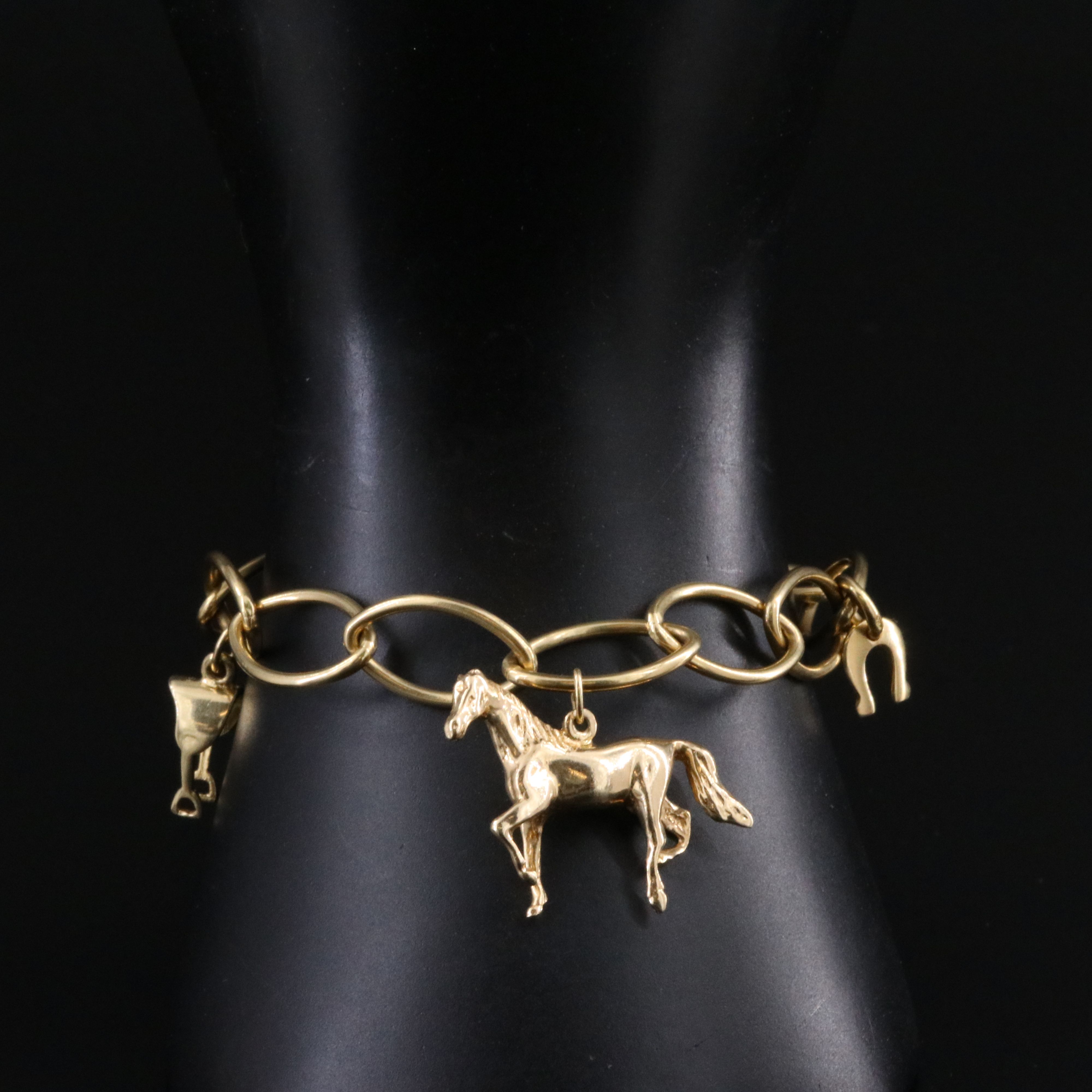 Tiffany & Co. 18K Oval Link Bracelet with Equestrian Themed Charms