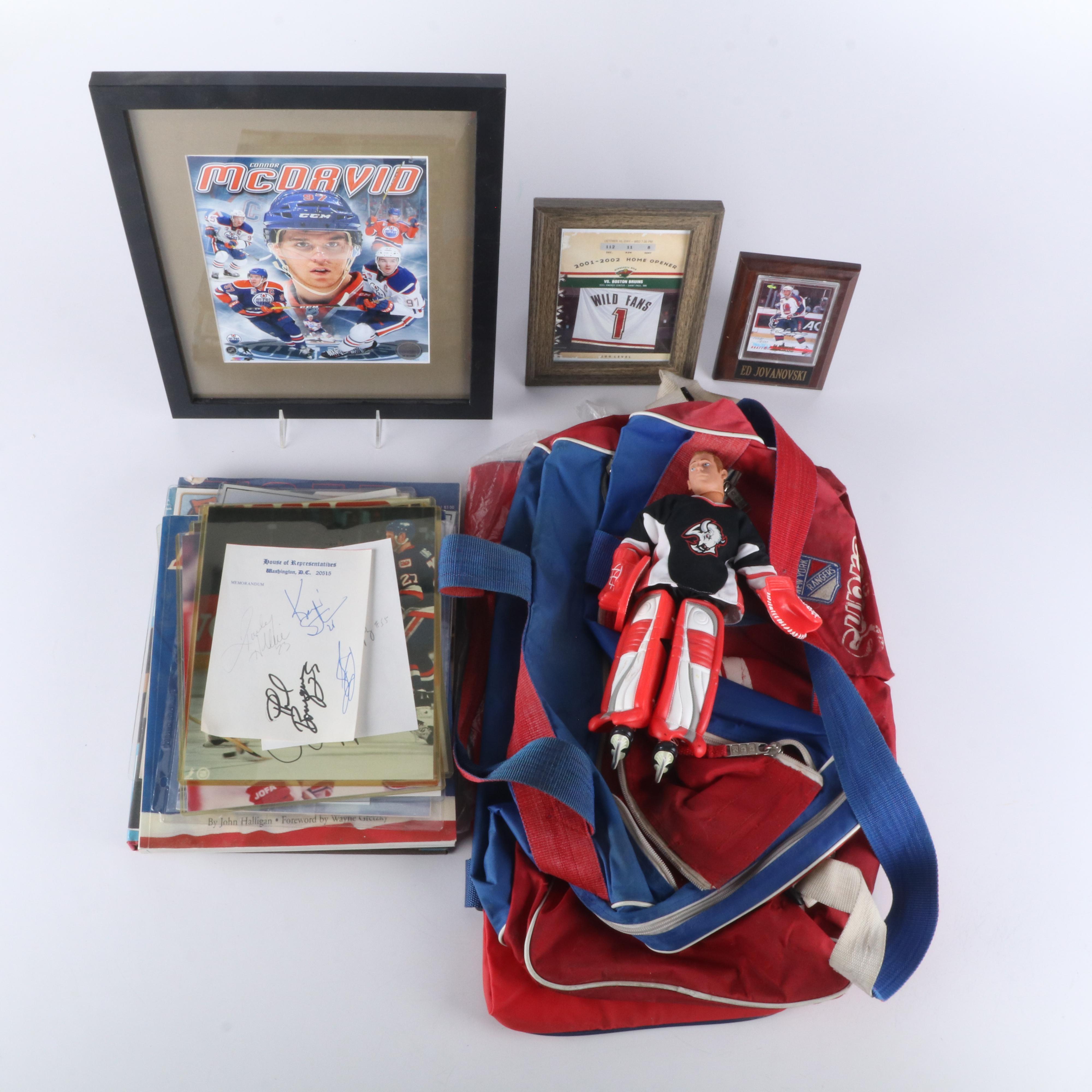 Hockey Memorabilia Featuring Signed Photos and Dominik Hašek Action Figure