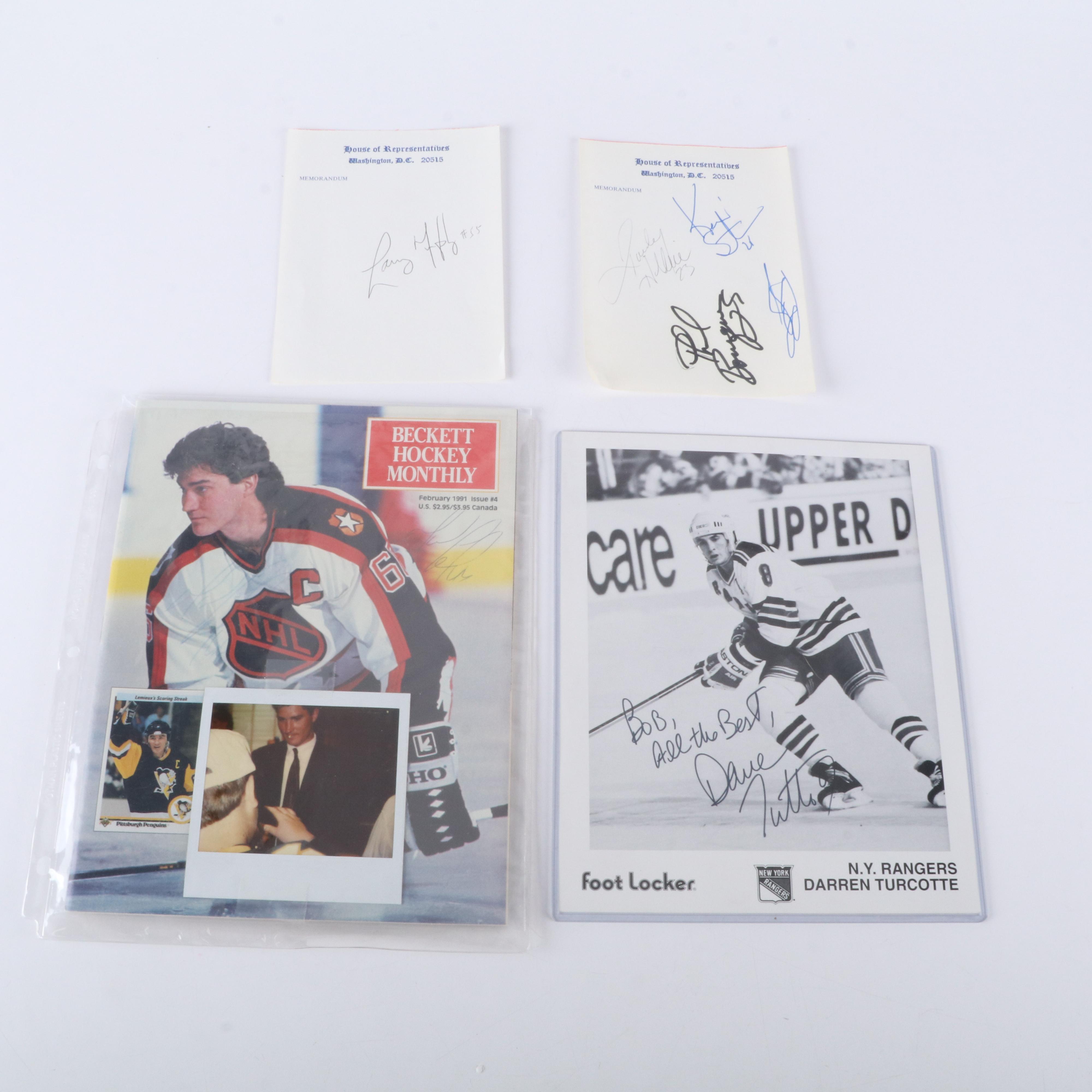 Hockey Memorabilia Featuring Signed Photos and Dominik Hašek Action Figure