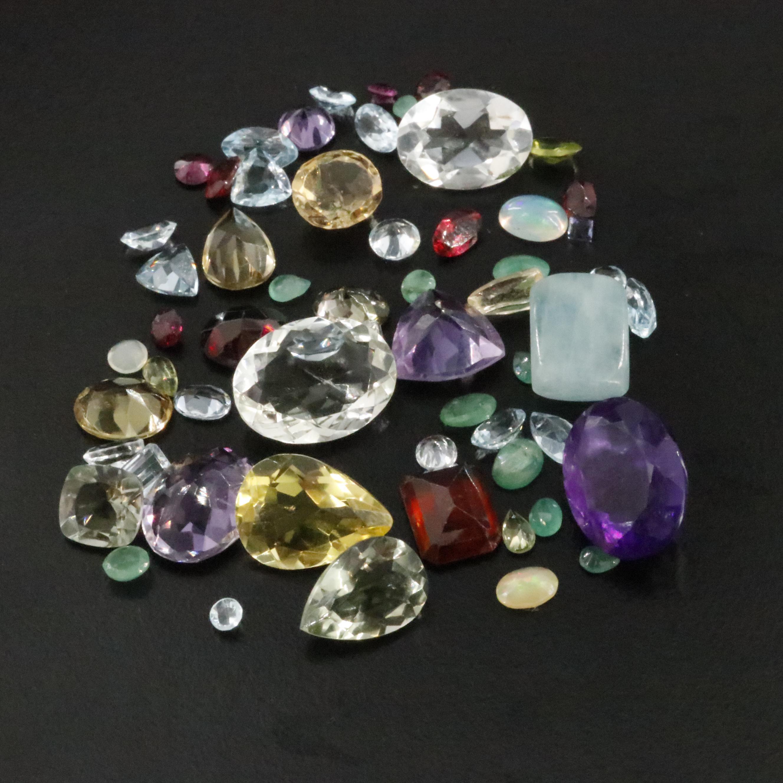 Loose 85.12 CTW Gemstones Including Amethyst, Citrine and Garnet