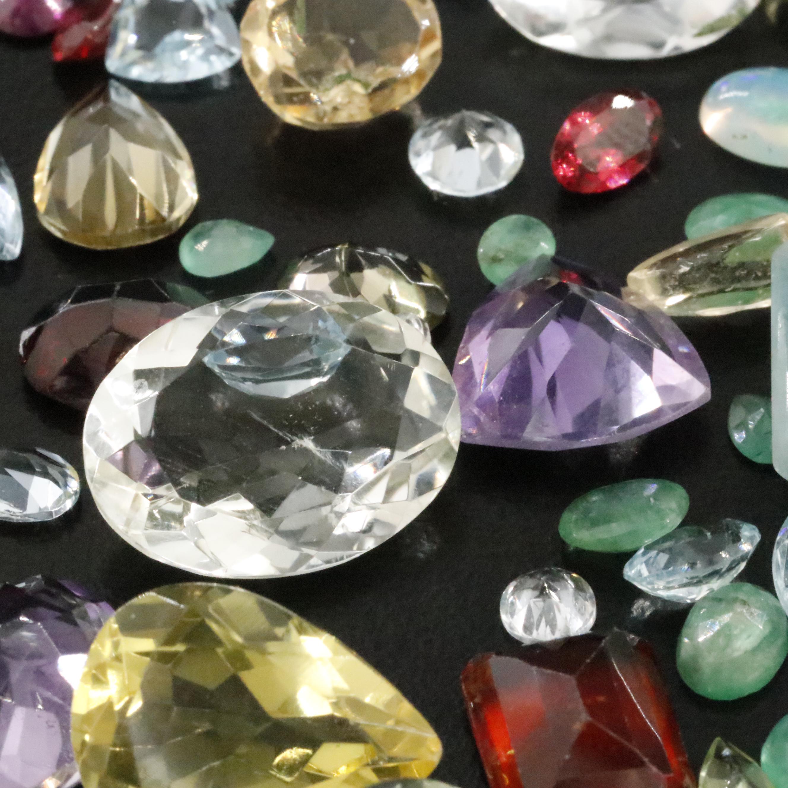 Loose 85.12 CTW Gemstones Including Amethyst, Citrine and Garnet