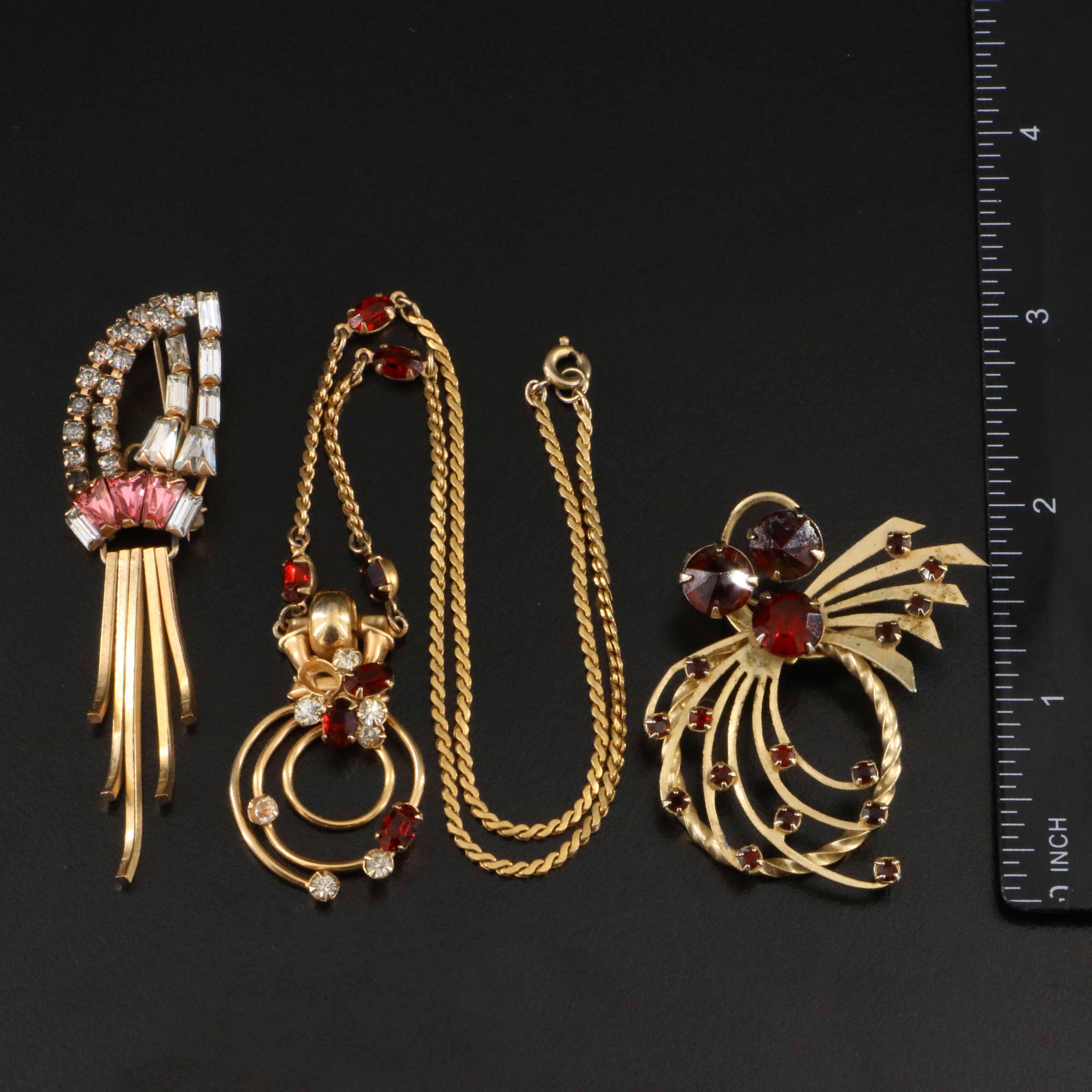 Necklaces and Brooches Featuring Trifari and Phyllis