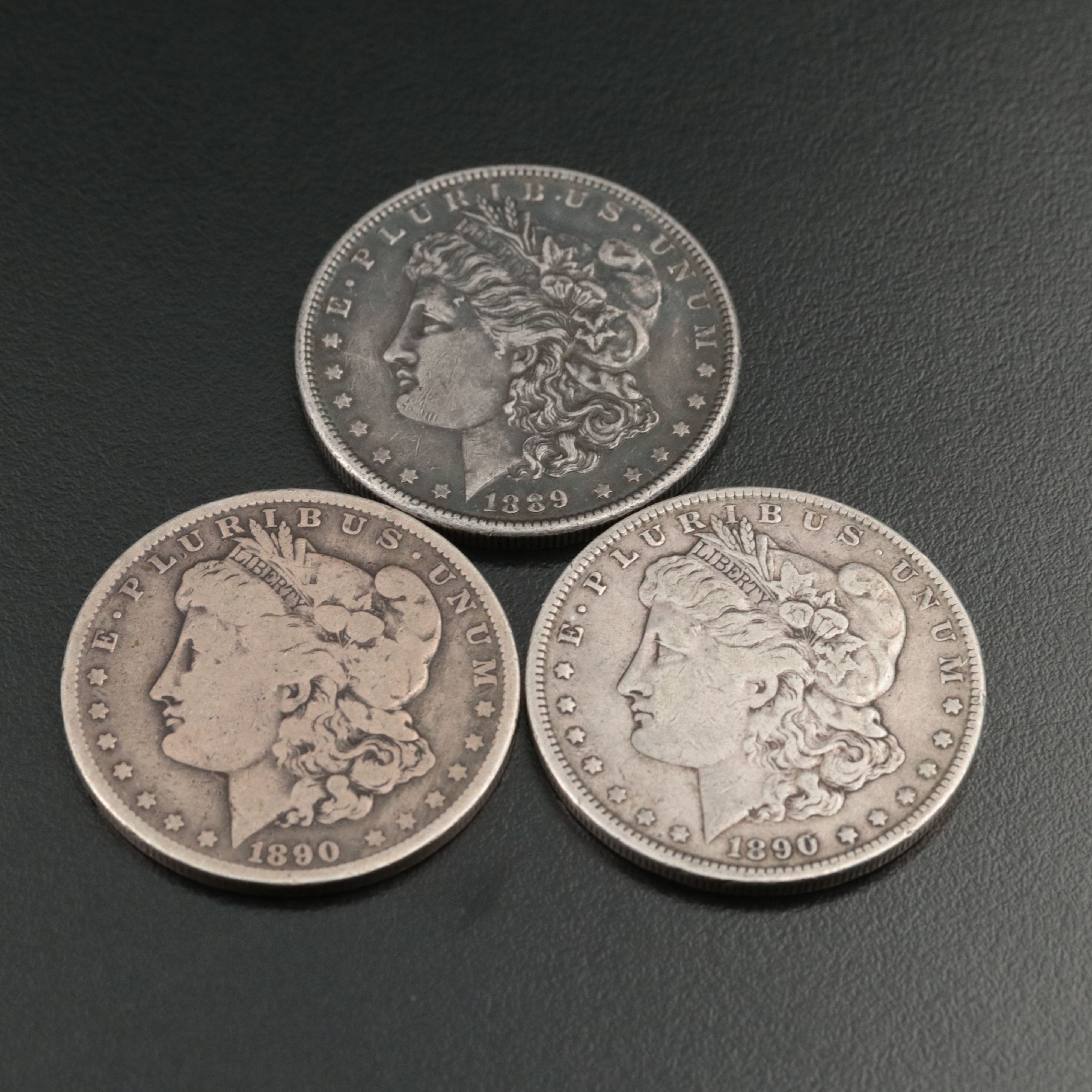Three Morgan Silver Dollars, Including 1890