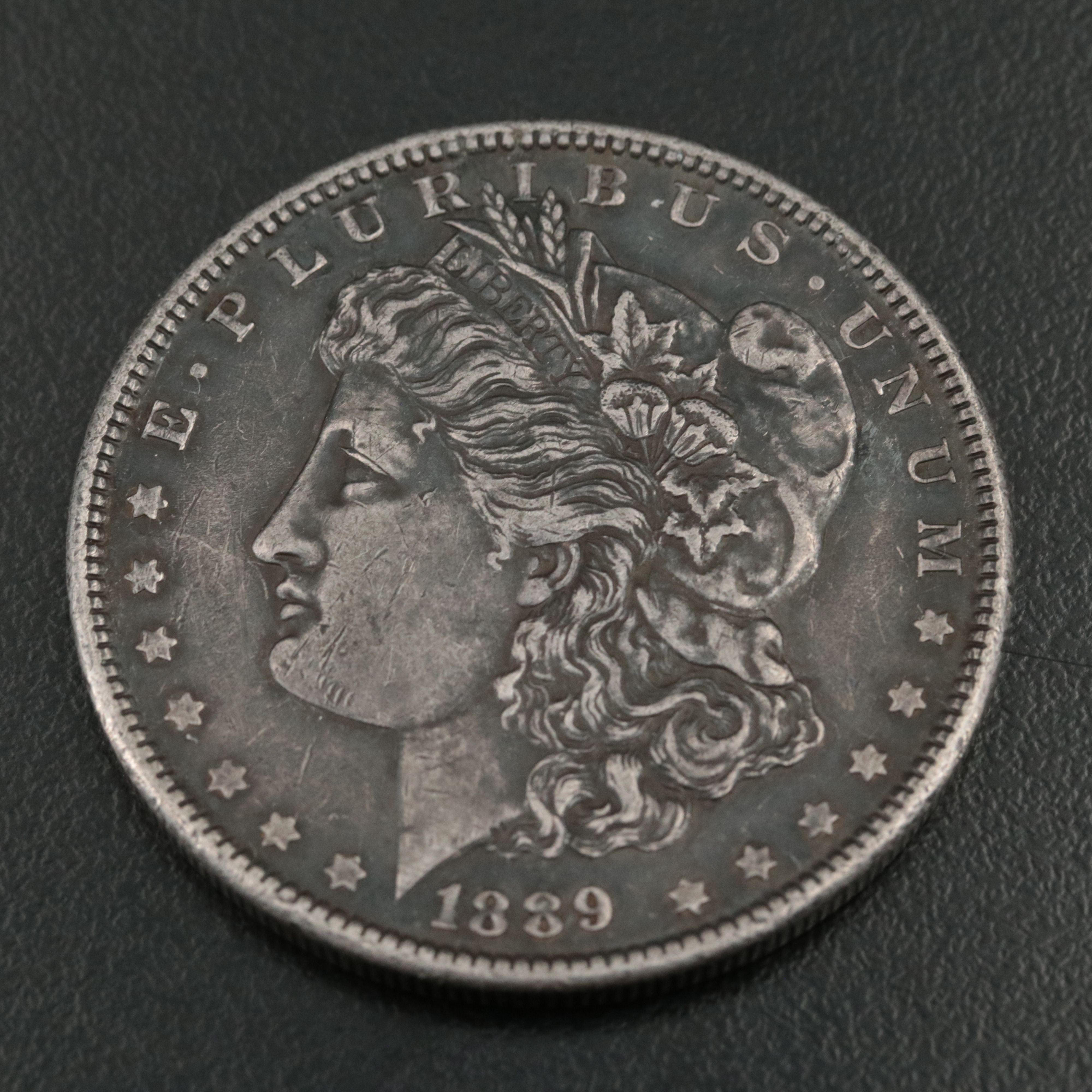 Three Morgan Silver Dollars, Including 1890