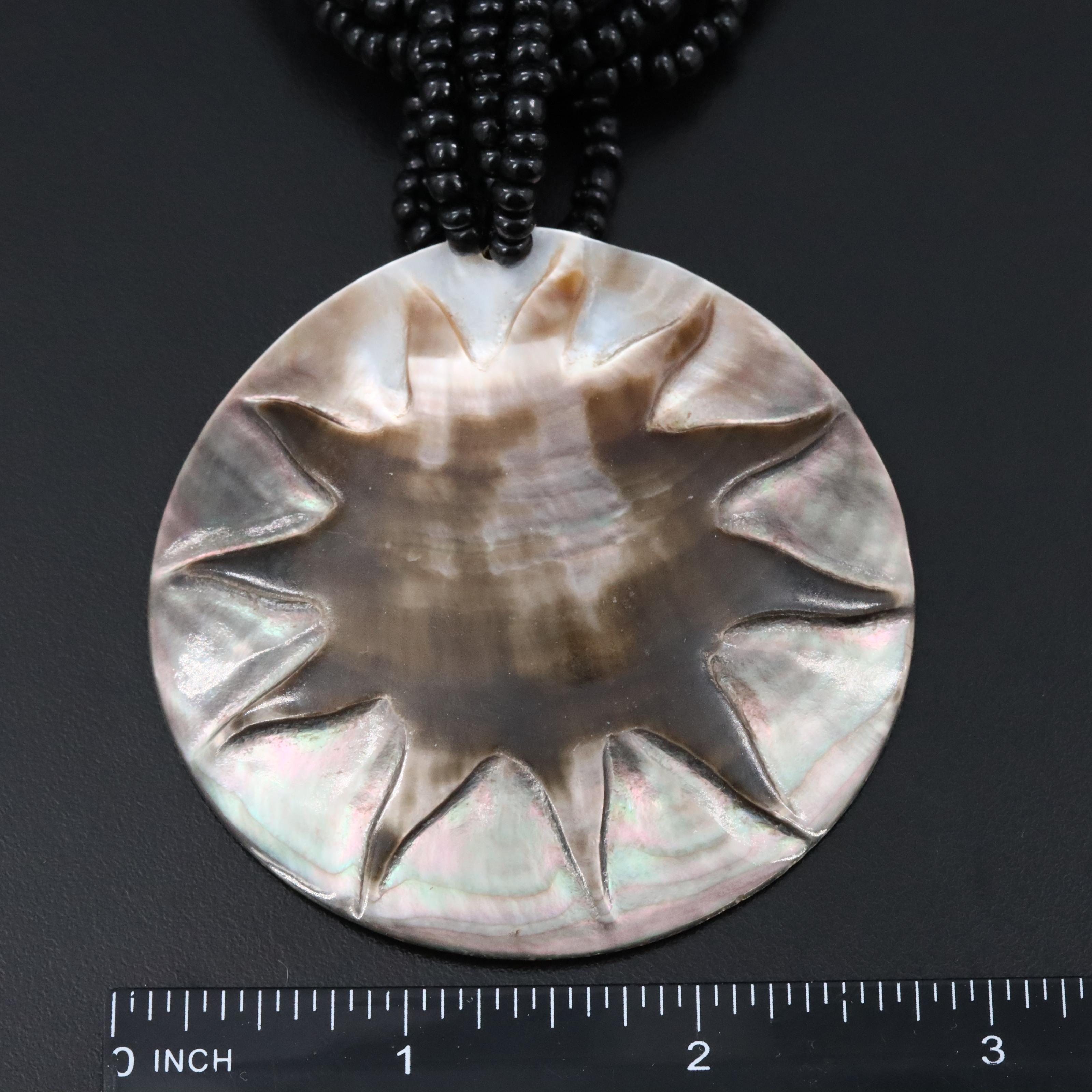 Necklaces Featuring Carved Mother-of-Pearl