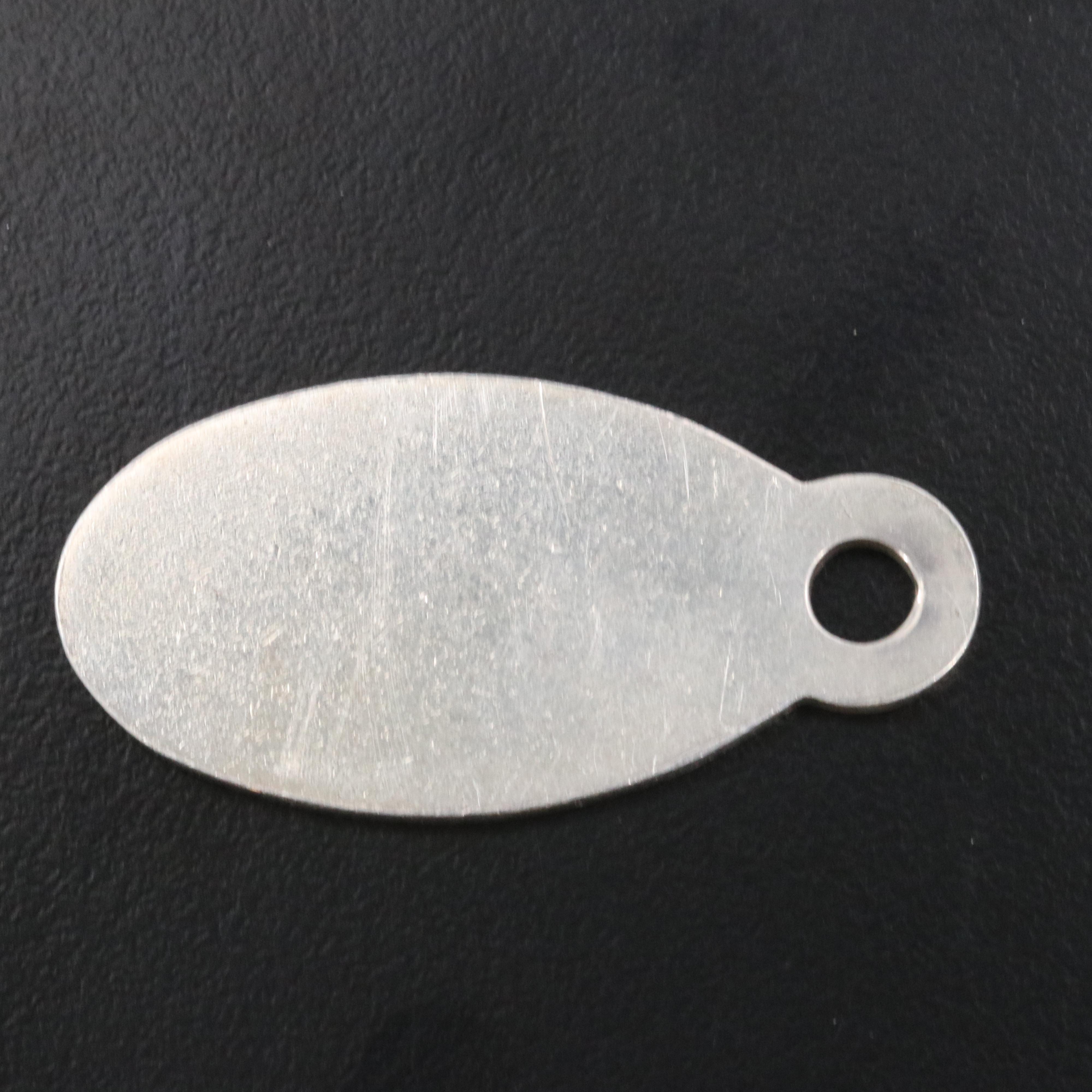 Tiffany & Co. "Please Return to Tiffany" Sterling Oval Pendant