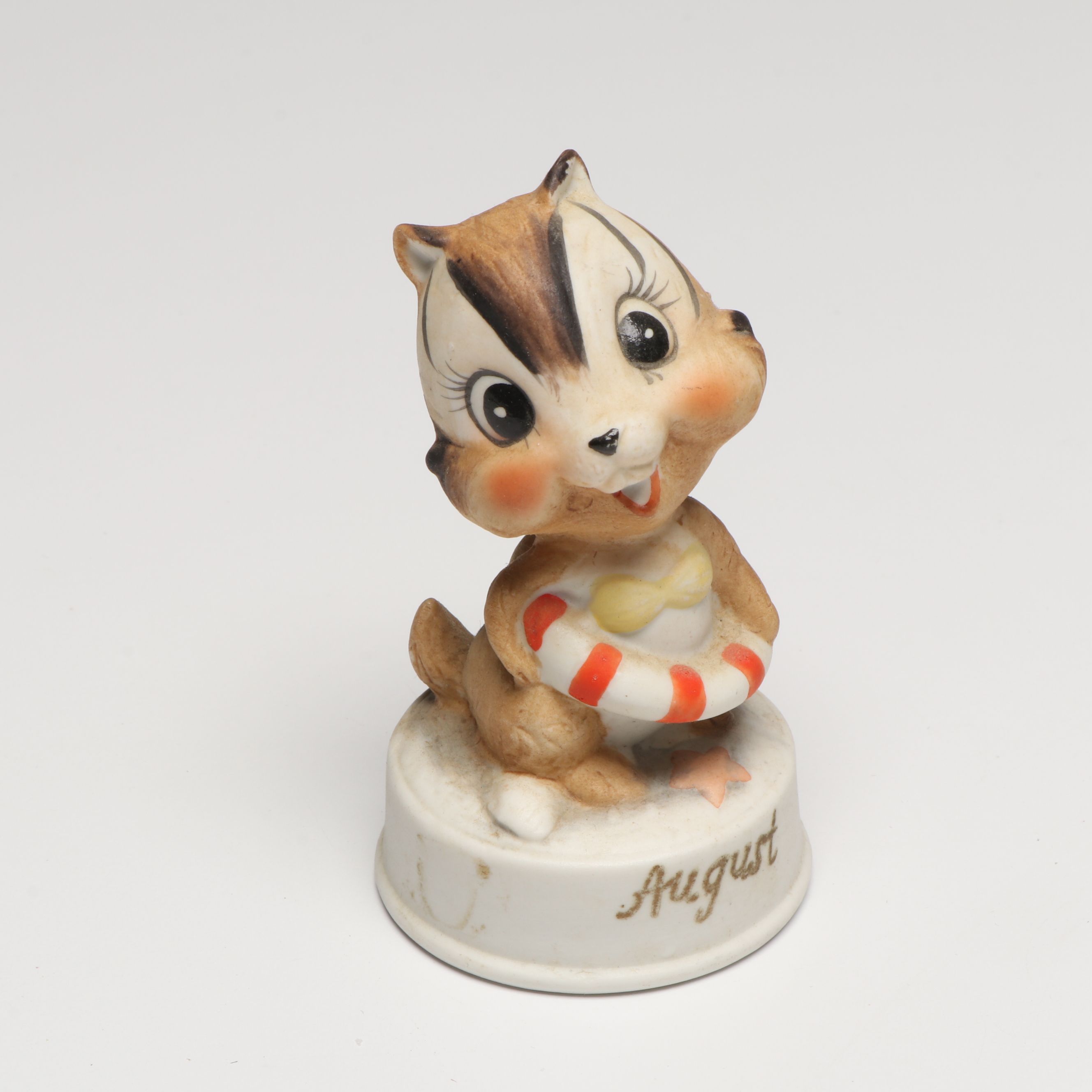 Avon "Sitting Pretty" Perfume Bottles with Figurines, Boxes and More