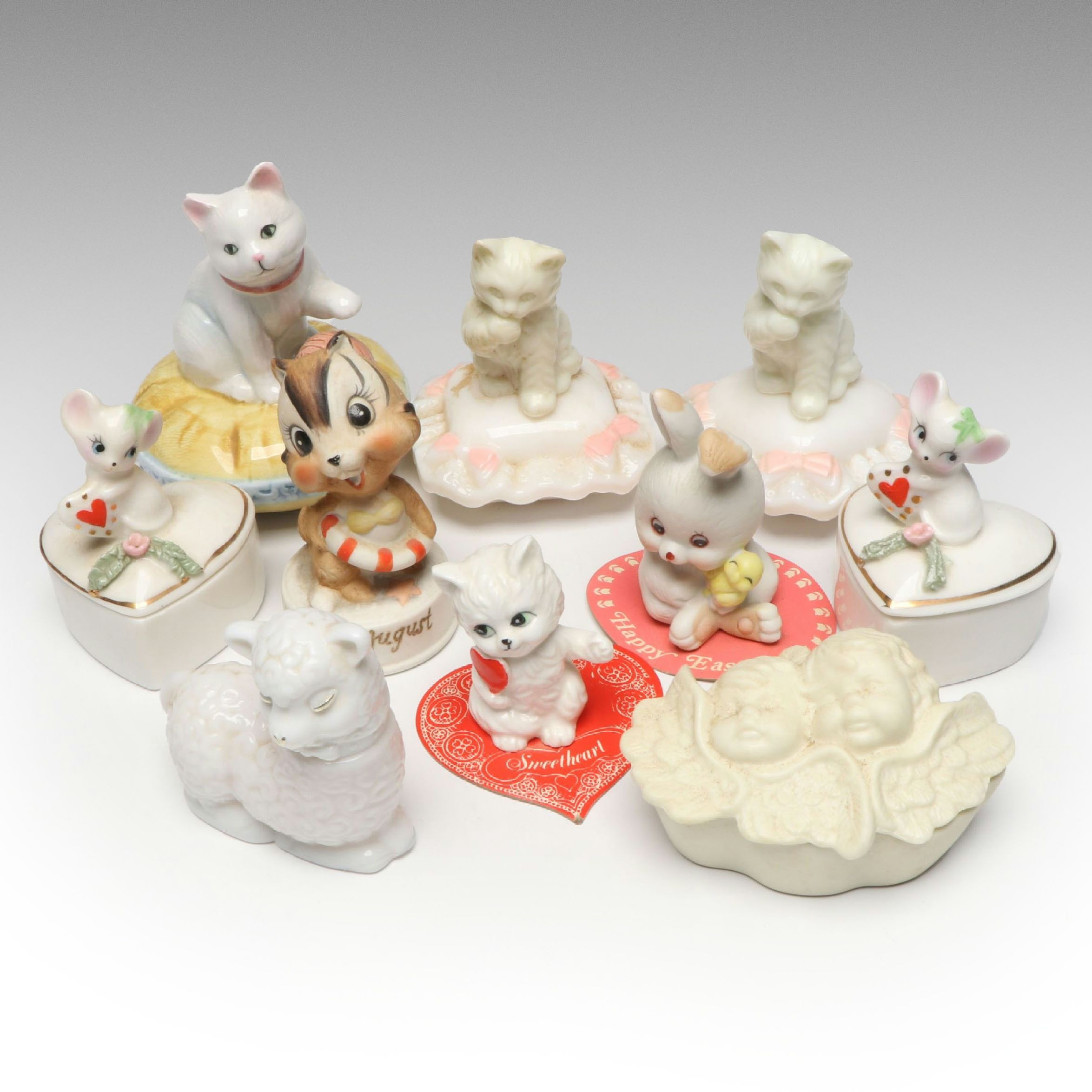 Avon "Sitting Pretty" Perfume Bottles with Figurines, Boxes and More