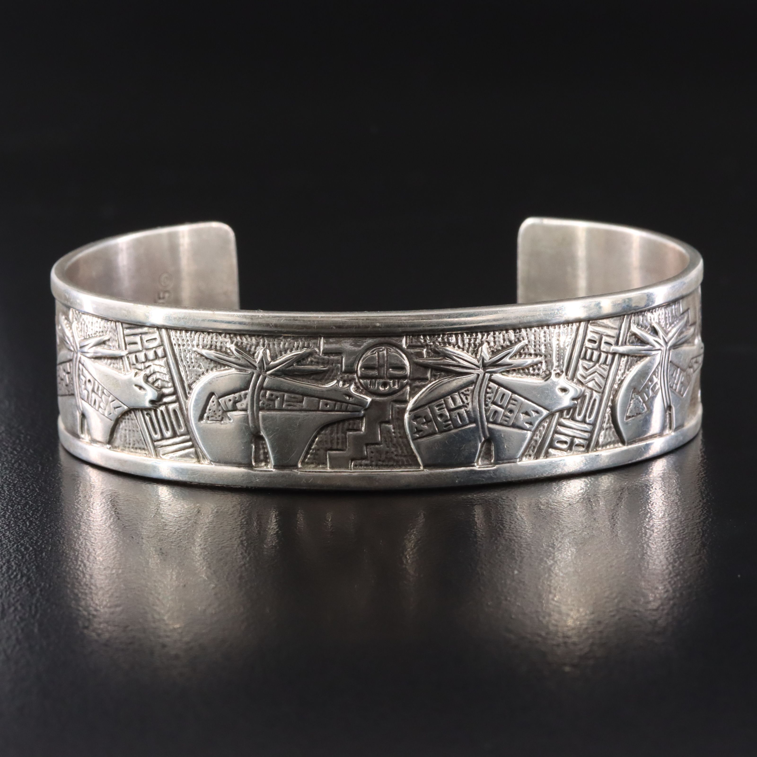 Roderick & Marilyn Tenorio Kewa for Relios Sterling Heartline Bear Cuff