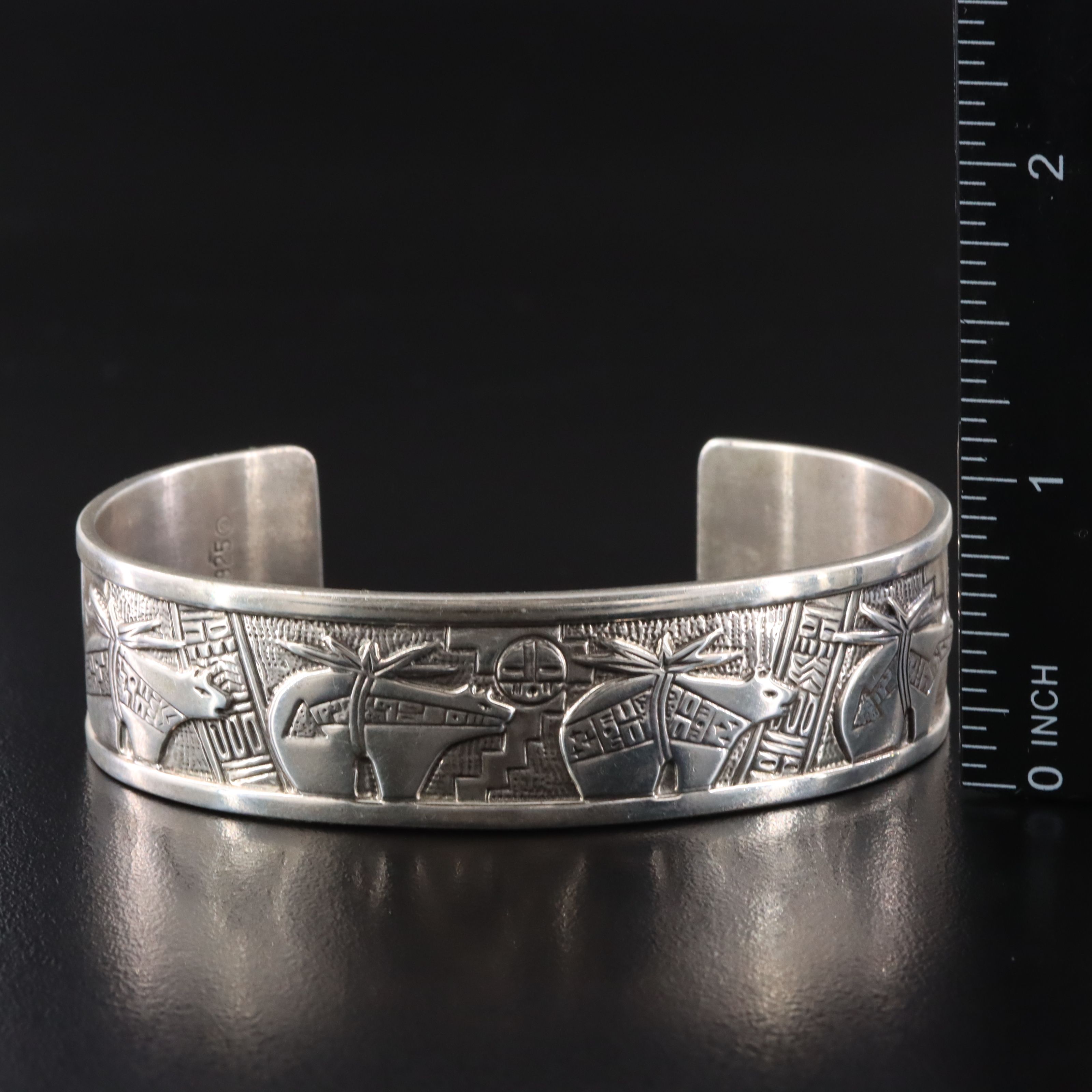 Roderick & Marilyn Tenorio Kewa for Relios Sterling Heartline Bear Cuff