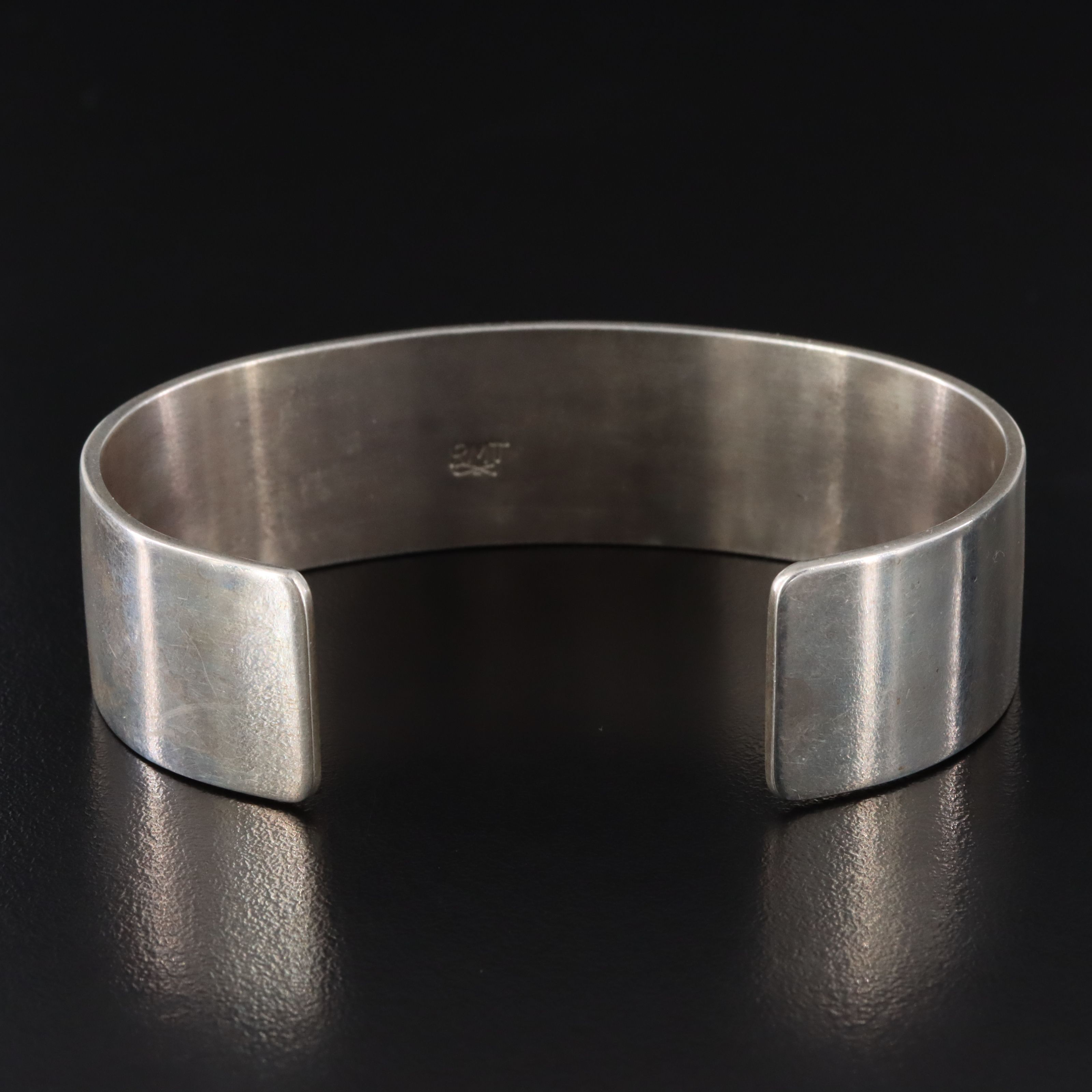 Roderick & Marilyn Tenorio Kewa for Relios Sterling Heartline Bear Cuff